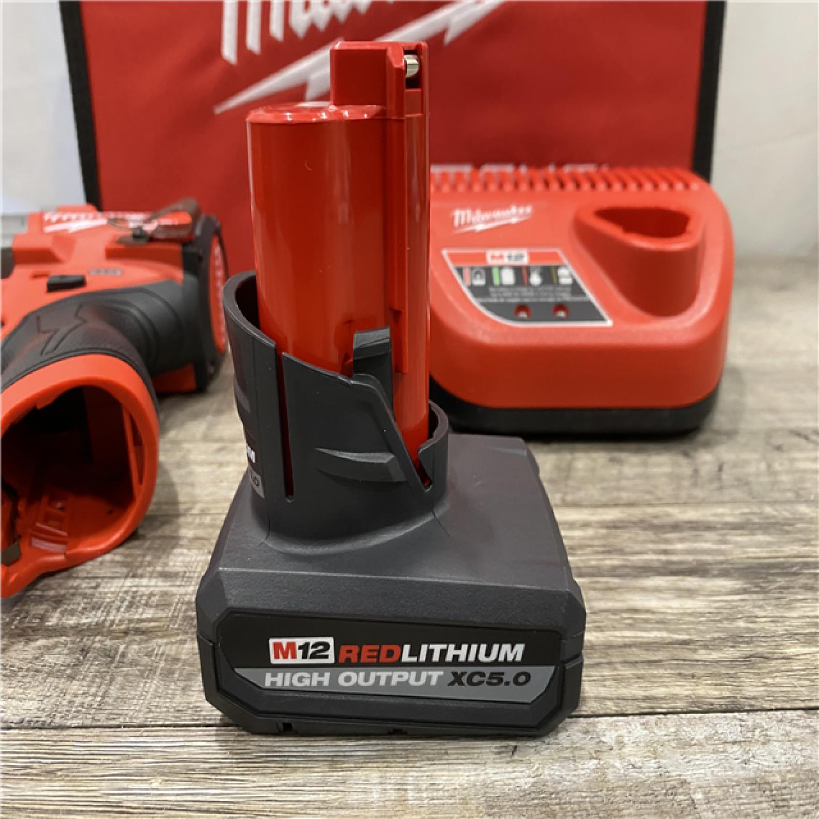 AS-IS Milwaukee FUEL 12V Li-Ion Brushless Cordless Stubby 3/8 in. Impact Wrench Kit