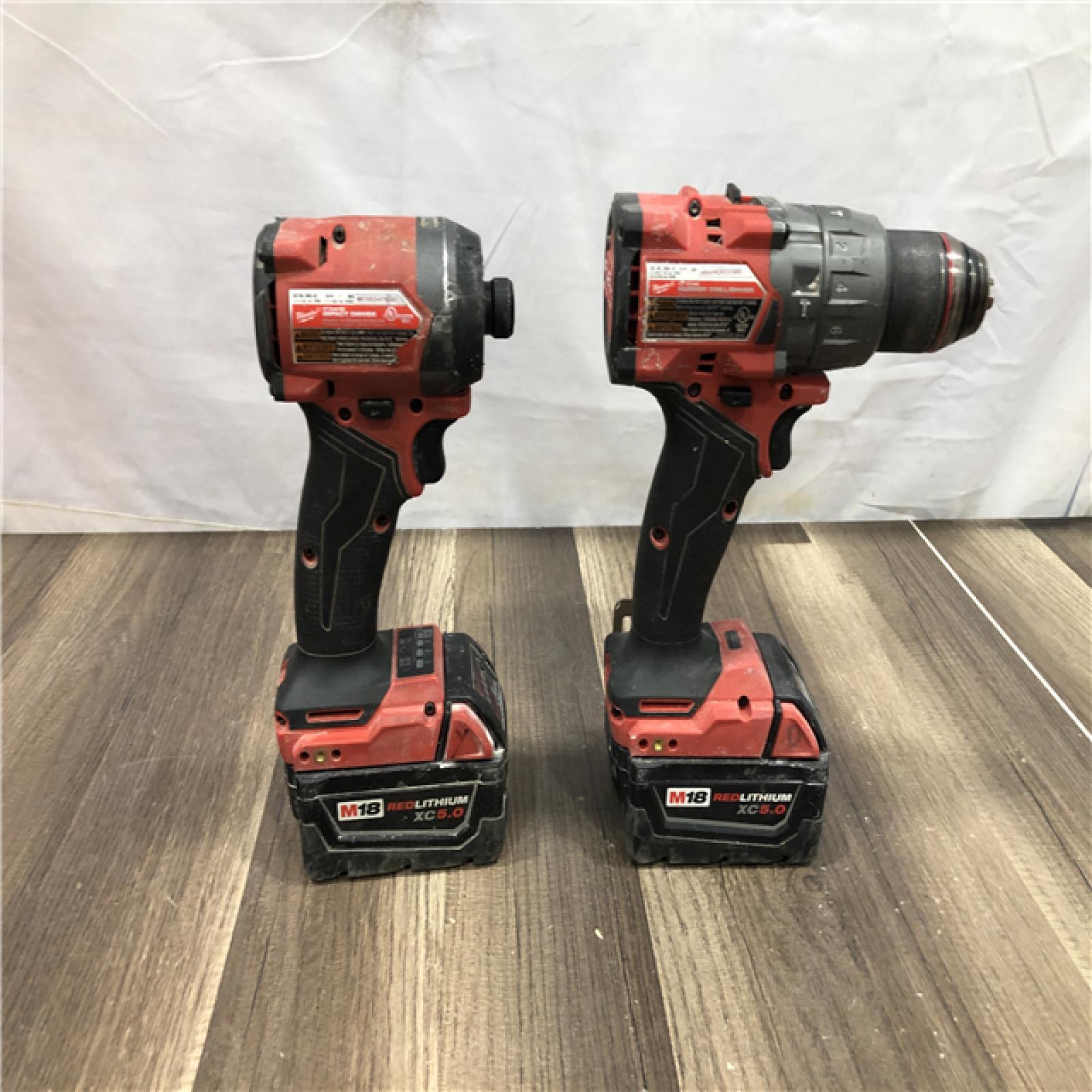 AS-IS Milwaukee FUEL 18V Lithium-Ion Brushless Cordless Hammer Drill and Impact Driver Combo Kit