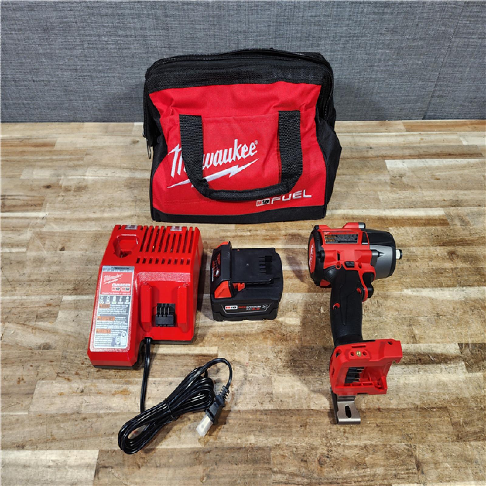 HOUSTON LOCATION - AS - IS Milwaukee FUEL Gen-2 18V Lithium-Ion Brushless Cordless Mid Torque 1/2 in. Impact Wrench w/Friction Ring COMBO KIT