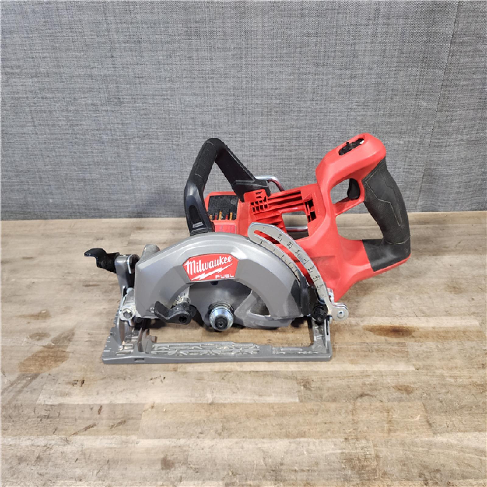 HOUSTON LOCATION - AS-IS MILWAUKEE 7-1/4 REAR HANDLE CIRCULAR SAW (TOOL ONLY)