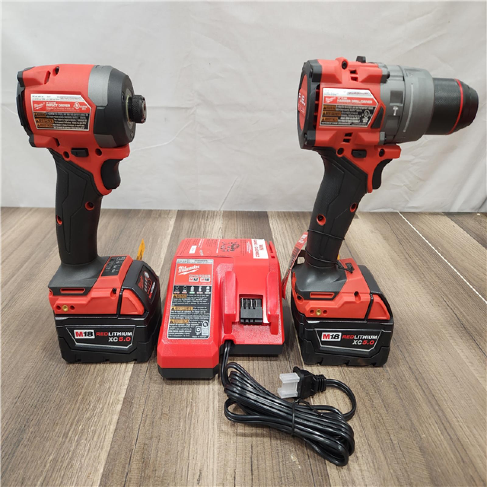 AS-IS- MILWAUKEE FUEL 18V Lithium-Ion Brushless Cordless Hammer Drill and Impact Driver Combo Kit