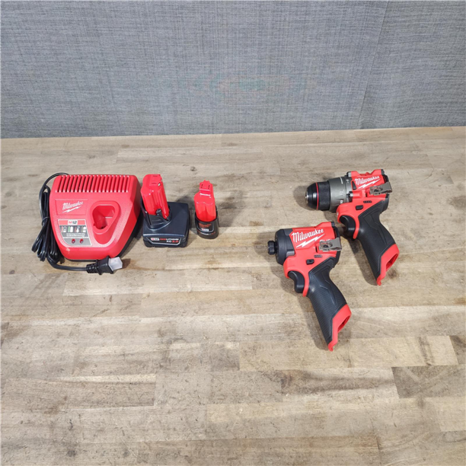 HOUSTON LOCATION - AS-IS Milwaukee 3497-22 12V Brushless Hammer Drill and Impact Driver Combo Kit