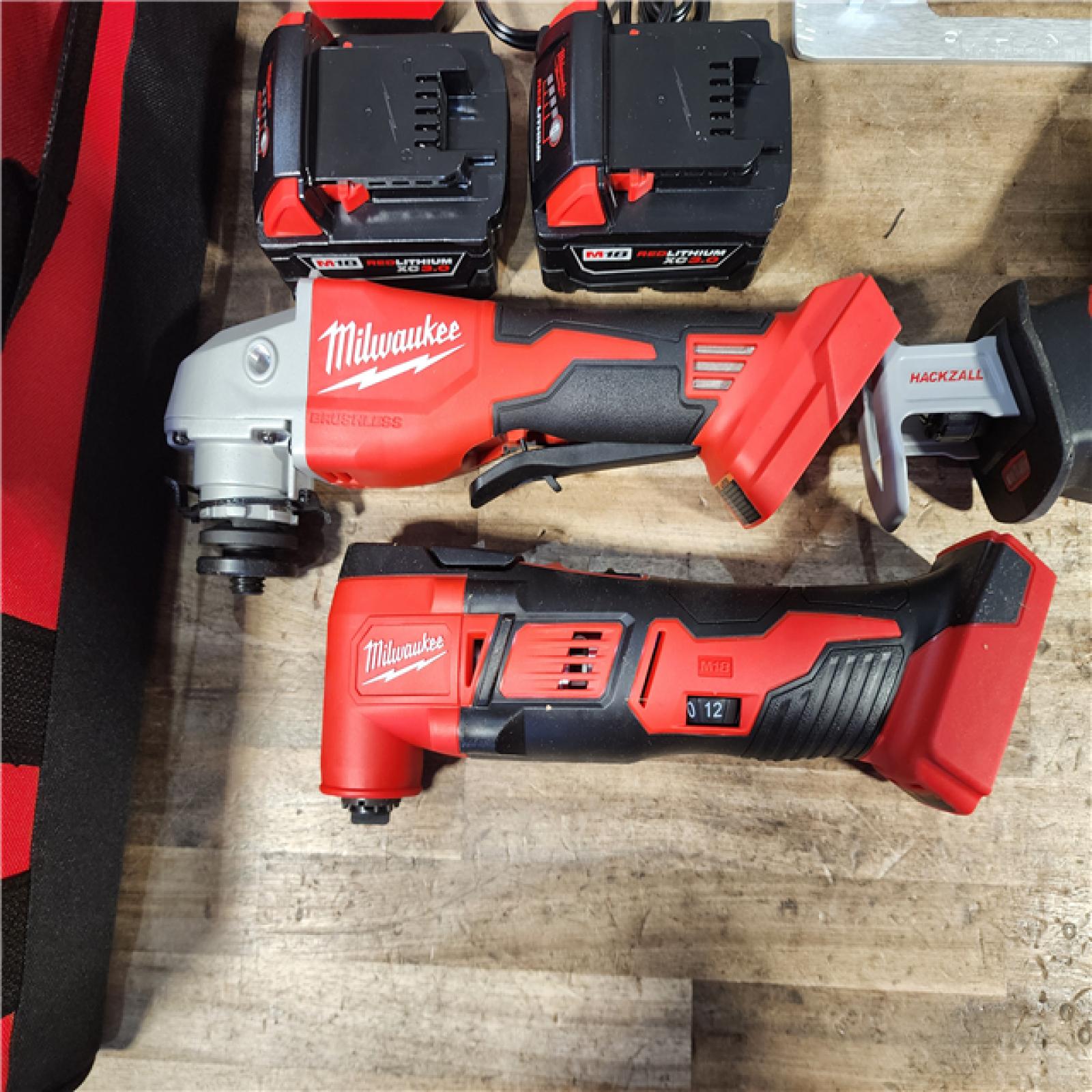 HOUSTON LOCATION - AS-IS (APPEARS LIKE NEW) M18 18-Volt Lithium-Ion Cordless Combo Kit 7-Tool with 2-Batteries  Charger and Tool Bag