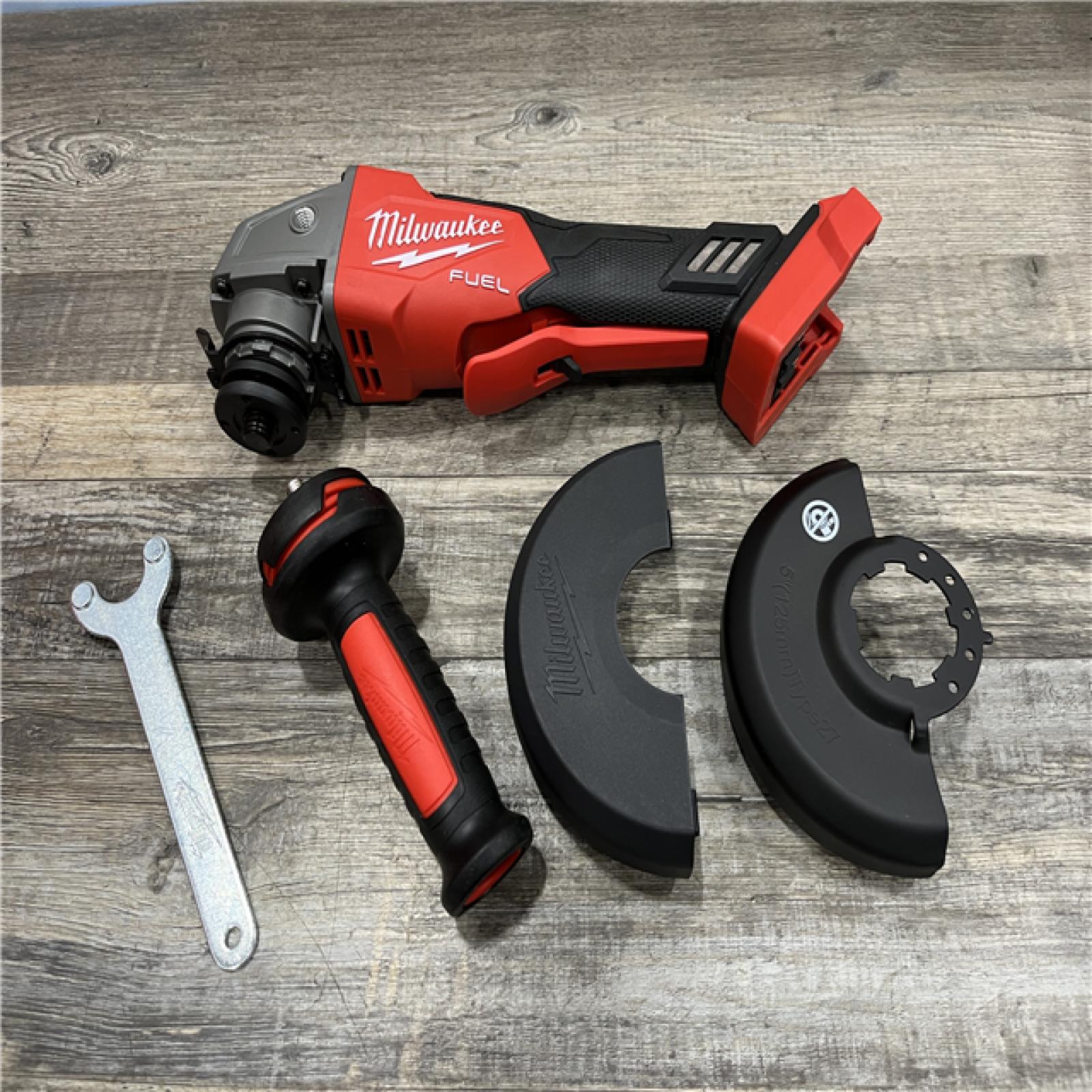 AS-IS Milwaukee FUEL 18V Lithium-Ion Brushless Cordless 4-1/2 in./5 in. Grinder w/Paddle Switch (Tool-Only)