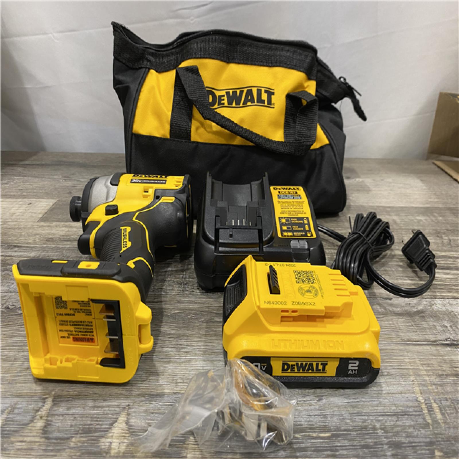 AS-IS DEWALT Atomic 20V Max Lithium-Ion Brushless Cordless Compact 1/4 in. Impact Driver Kit
