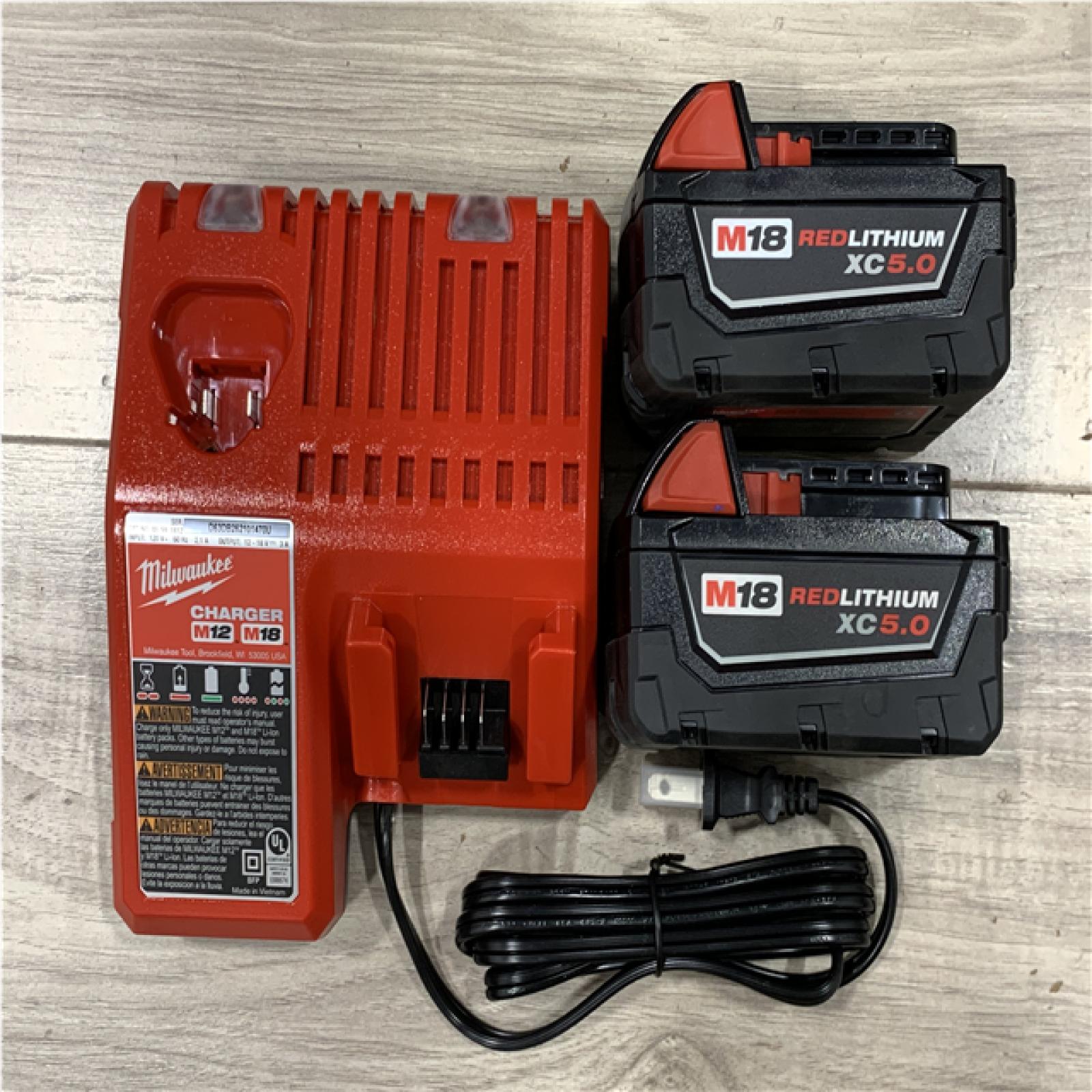 AS-IS Milwaukee FUEL 18V Lithium-Ion Brushless Cordless Hammer Drill and Impact Driver Combo Kit