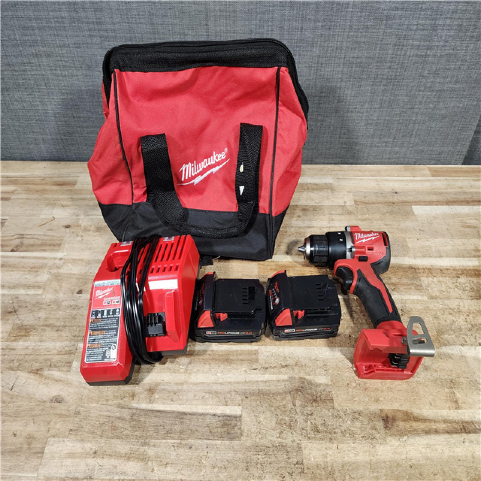 HOUSTON LOCATION - AS - IS Milwaukee 18V Lithium-Ion Brushless Cordless 1/2 in. Compact Drill/Driver with kit