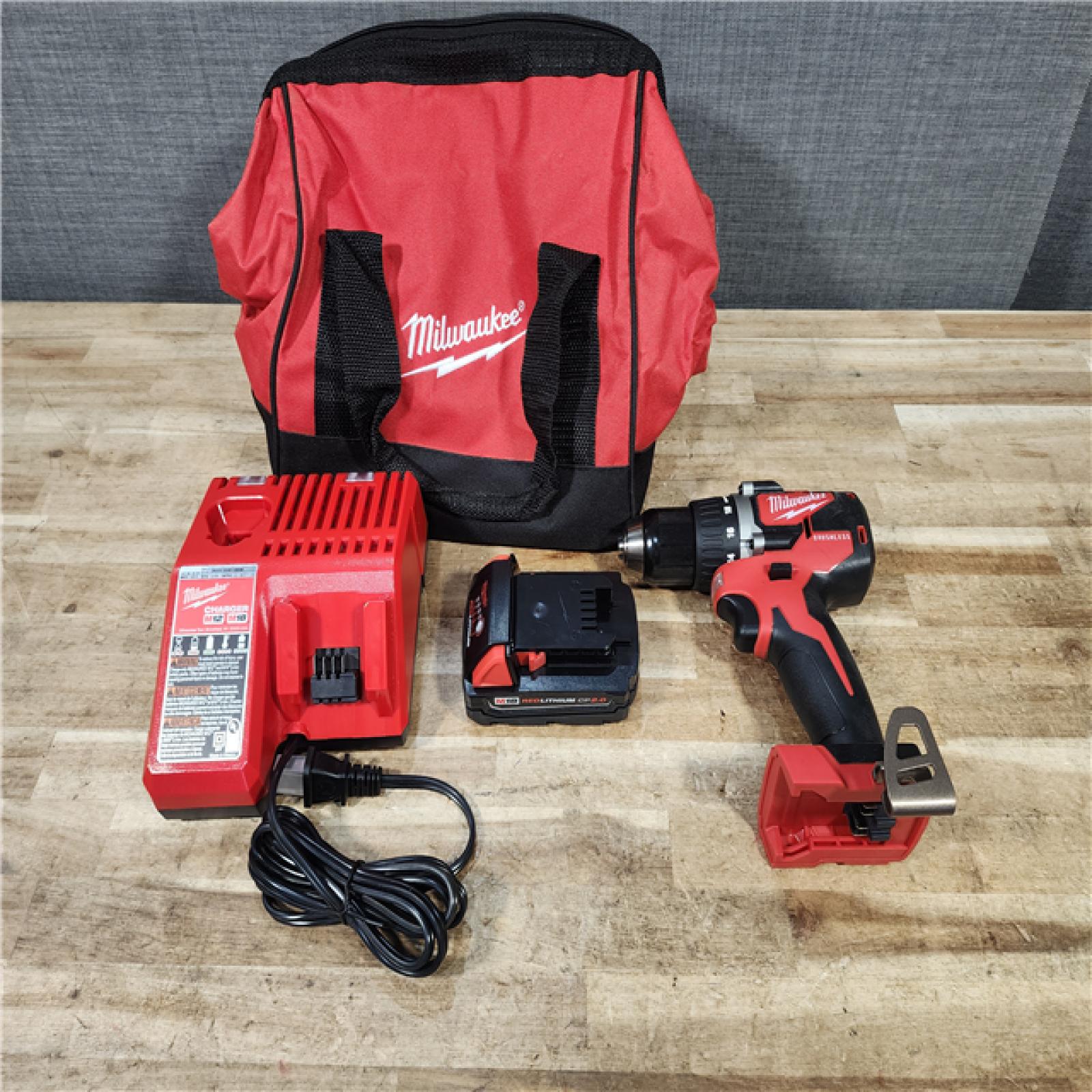HOUSTON LOCATION - AS - IS Milwaukee 18V Lithium-Ion Brushless Cordless 1/2 in. Compact Drill/Driver with kit