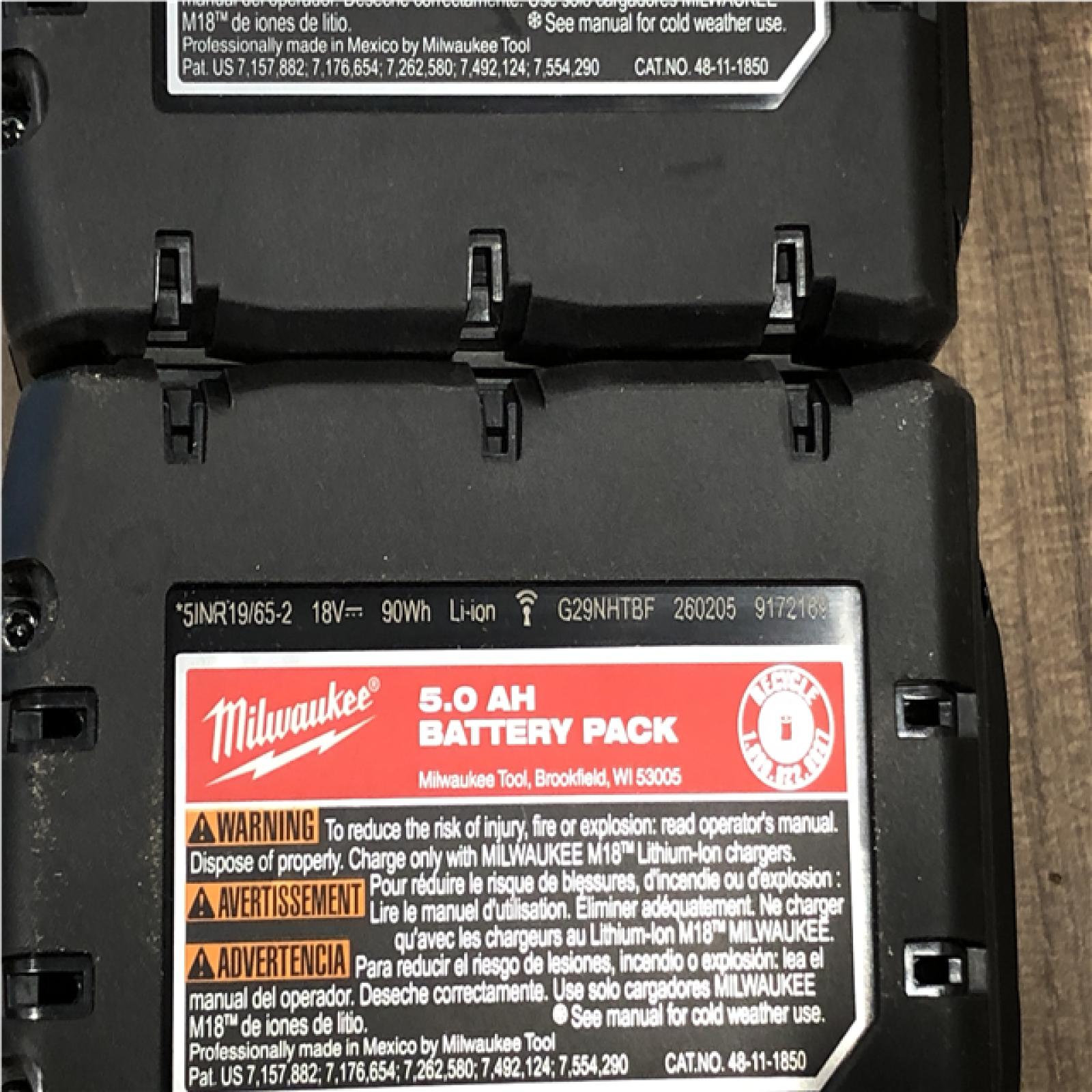 AS-IS Milwaukee 18-Volt Lithium-Ion XC Starter Kit with (2) 5.0Ah Batteries and Charger