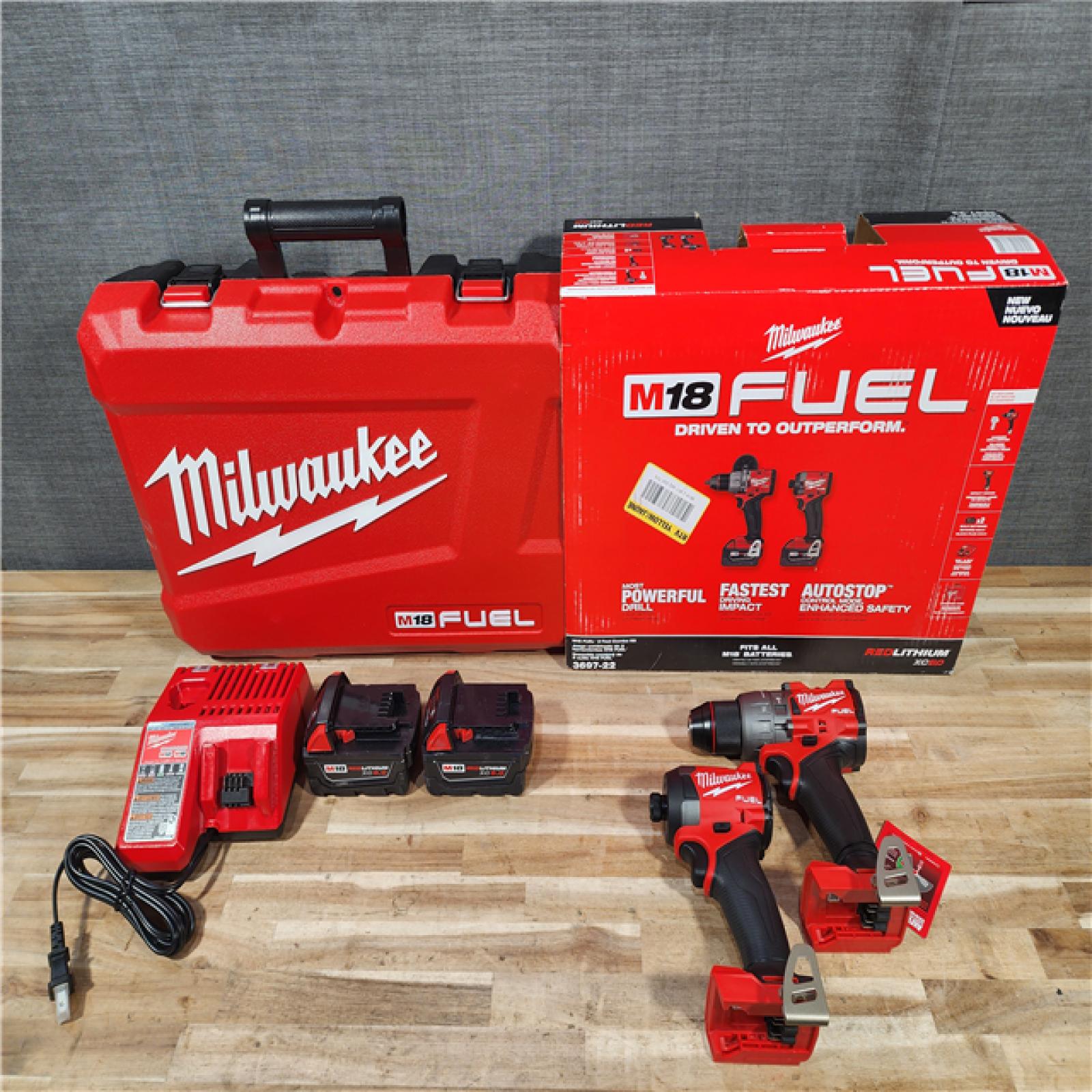 HOUSTON LOCATION - AS-IS (APPEARS LIKE NEW) Milwaukee  FUEL 18V Lithium-Ion Brushless Cordless Hammer Drill and Impact Driver Combo Kit