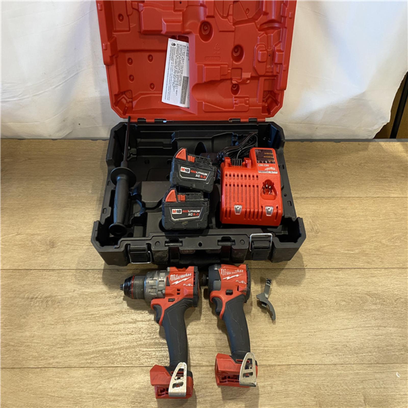 AS-IS Milwaukee FUEL 18V Lithium-Ion Brushless Cordless Hammer Drill and Impact Driver Combo Kit