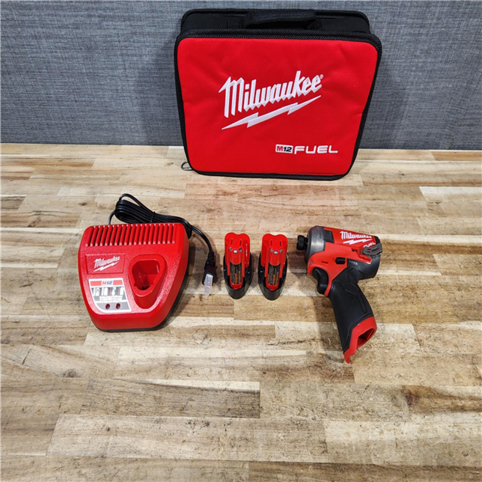 HOUSTON LOCATION - AS - IS Milwaukee FUEL SURGE 12V Lithium-Ion Brushless Cordless 1/4 in. Hex Impact Driver Compact Kit