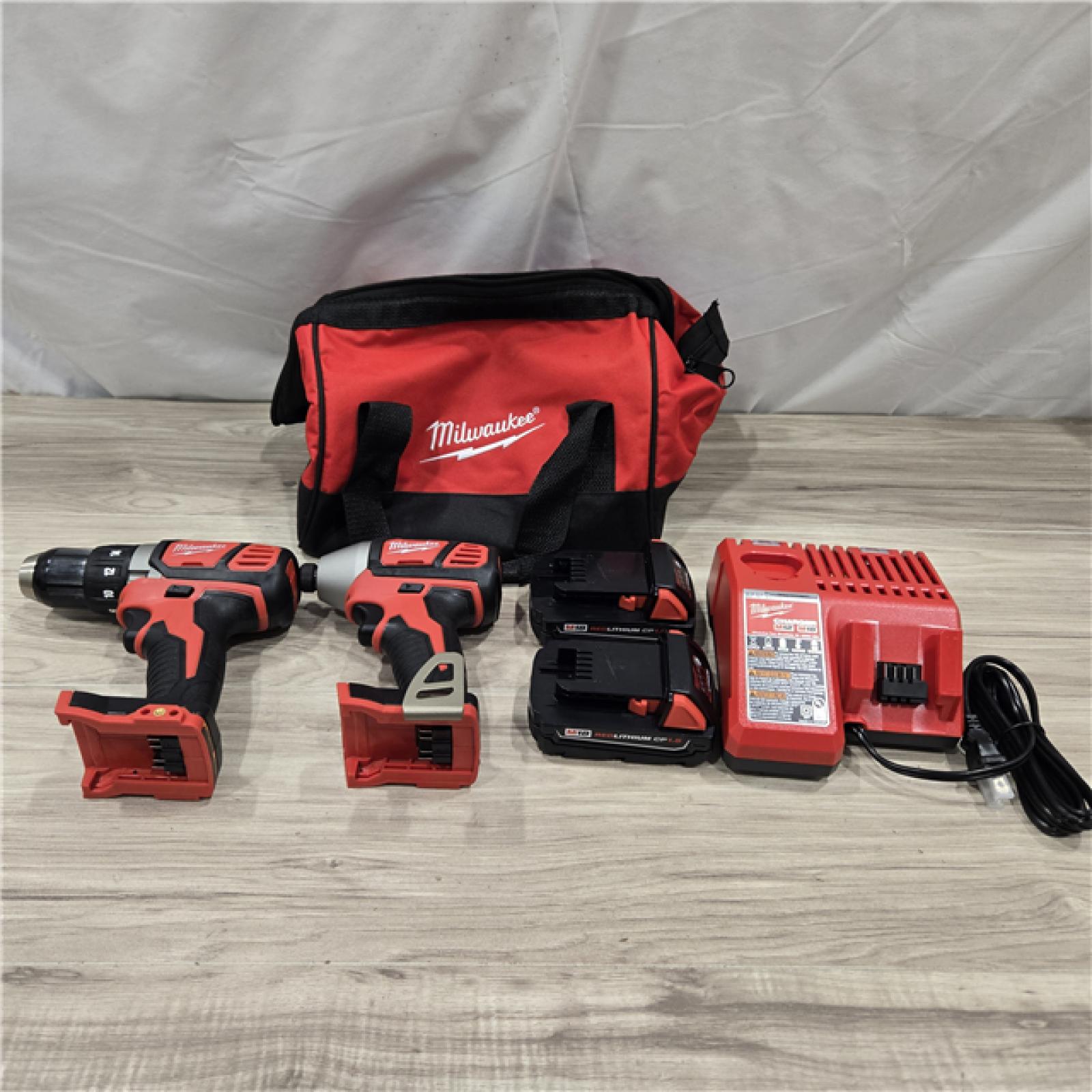 AS-IS Milwaukee 18V Cordless 2-Tool Drill/Driver and Impact Driver Kit
