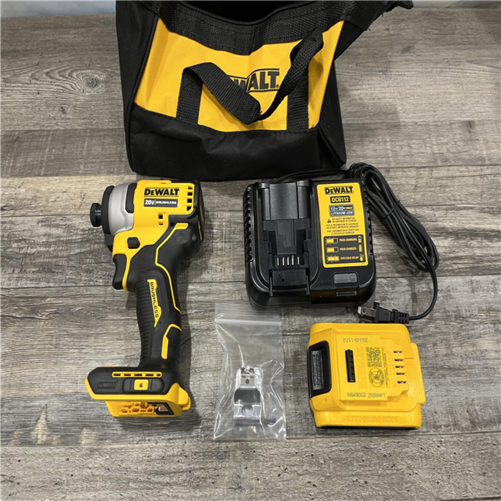 AS-IS DEWALT Atomic 20V Max Lithium-Ion Brushless Cordless Compact 1/4 in. Impact Driver Kit