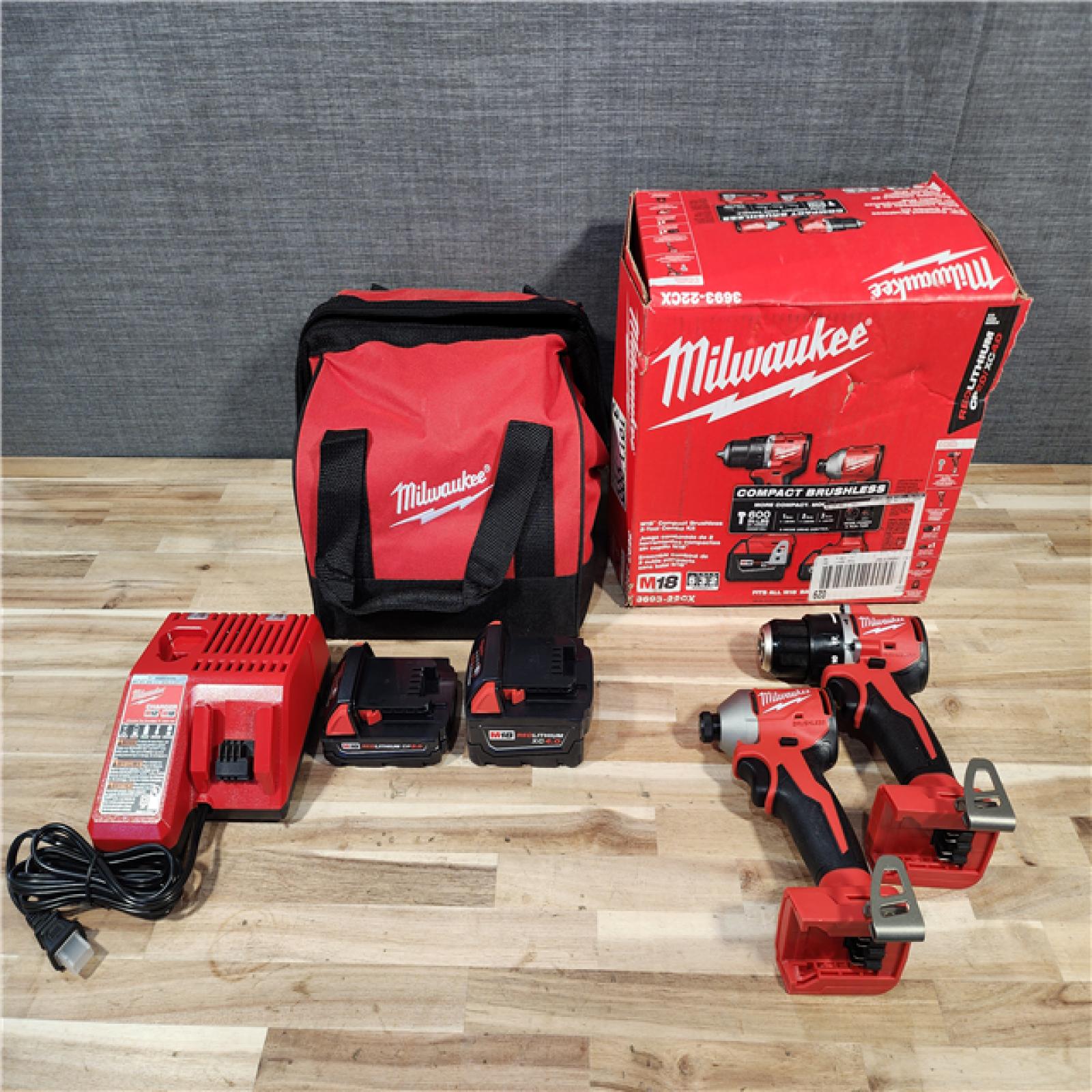 HOUSTON LOCATION - AS-IS M18 18-Volt Lithium-Ion Brushless Cordless Compact Hammer Drill/Impact Combo Kit (2-Tool) with (2) Batteries  Bag