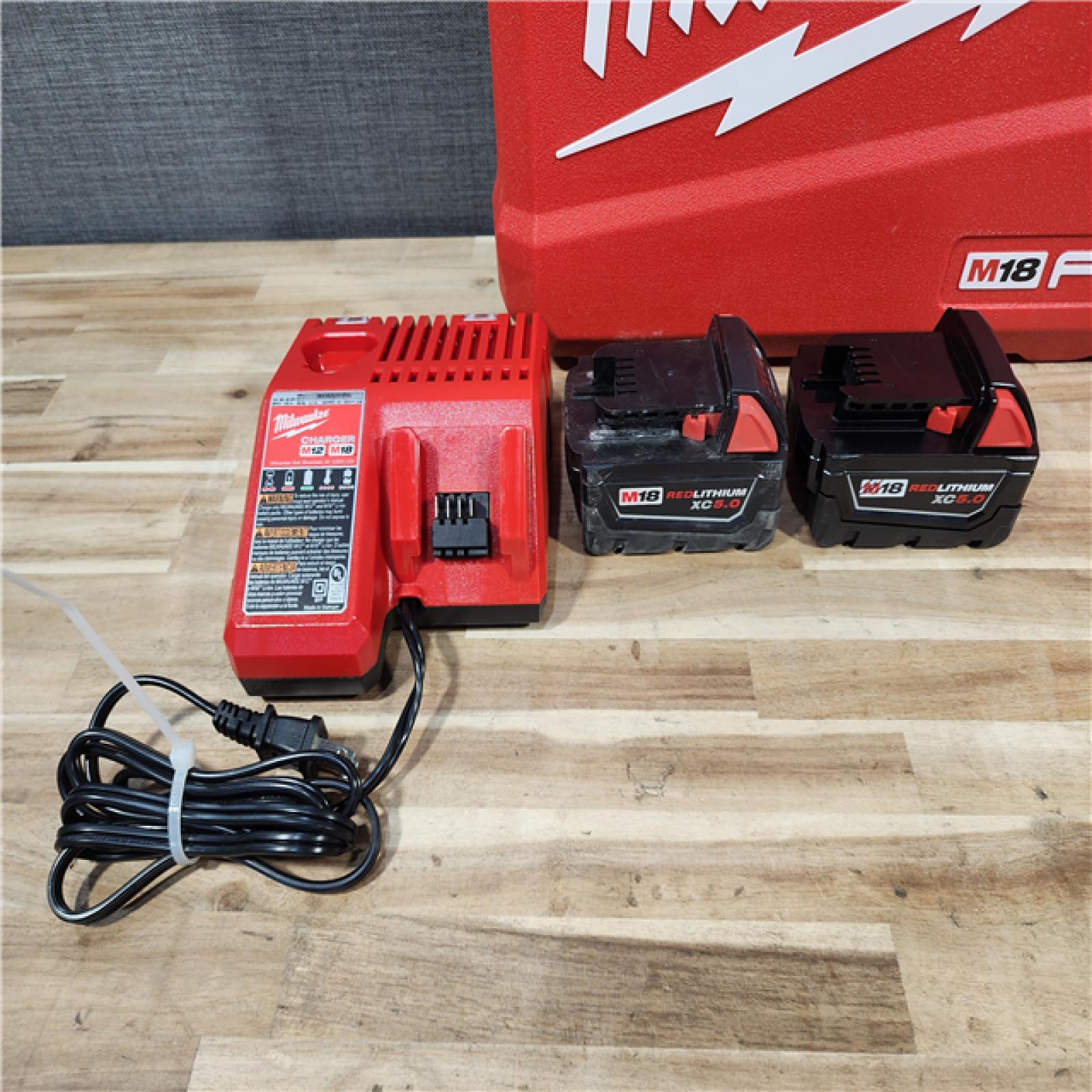 HOUSTON LOCATION - AS-IS Milwaukee  FUEL 18V Lithium-Ion Brushless Cordless Hammer Drill and Impact Driver Combo Kit