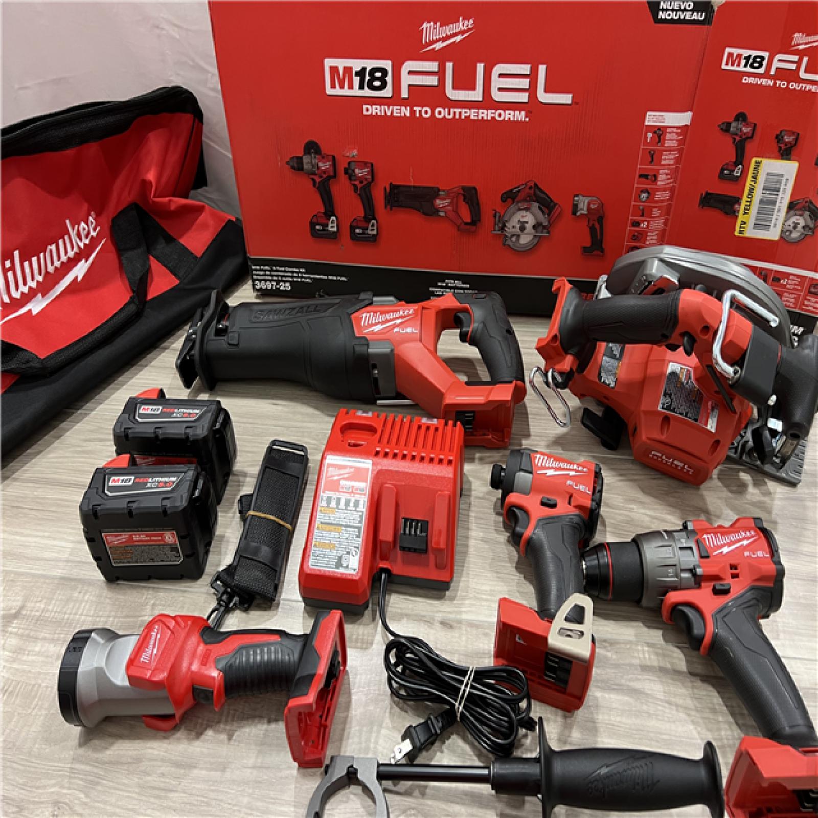 LIKE NEW Milwaukee M18 FUEL 18V Lithium-Ion Brushless Cordless Combo Kit (5-Tool) with Two 5.0 Ah Batteries  1 Charger 1 Tool Bag