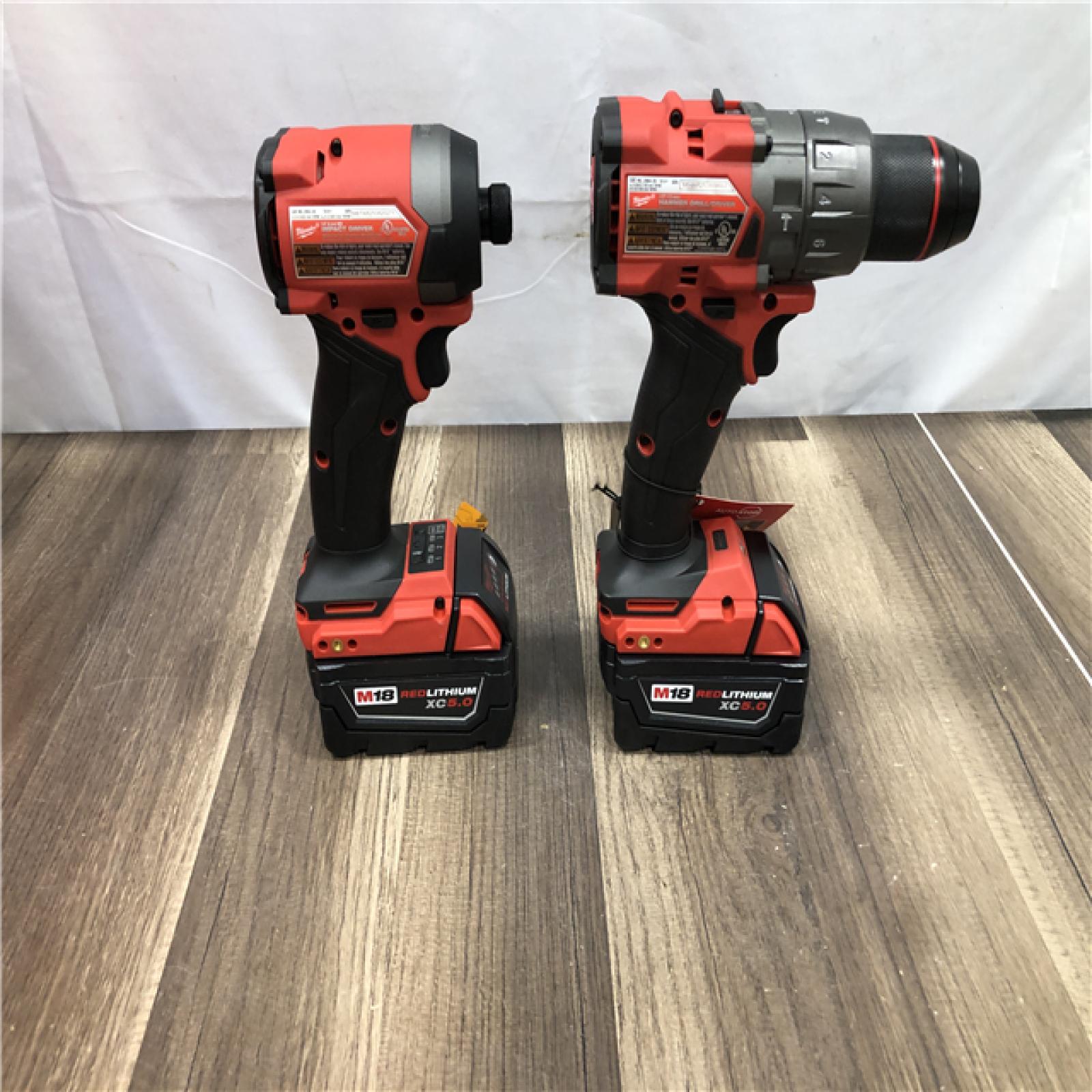 AS-IS Milwaukee FUEL 18V Lithium-Ion Brushless Cordless Hammer Drill and Impact Driver Combo Kit