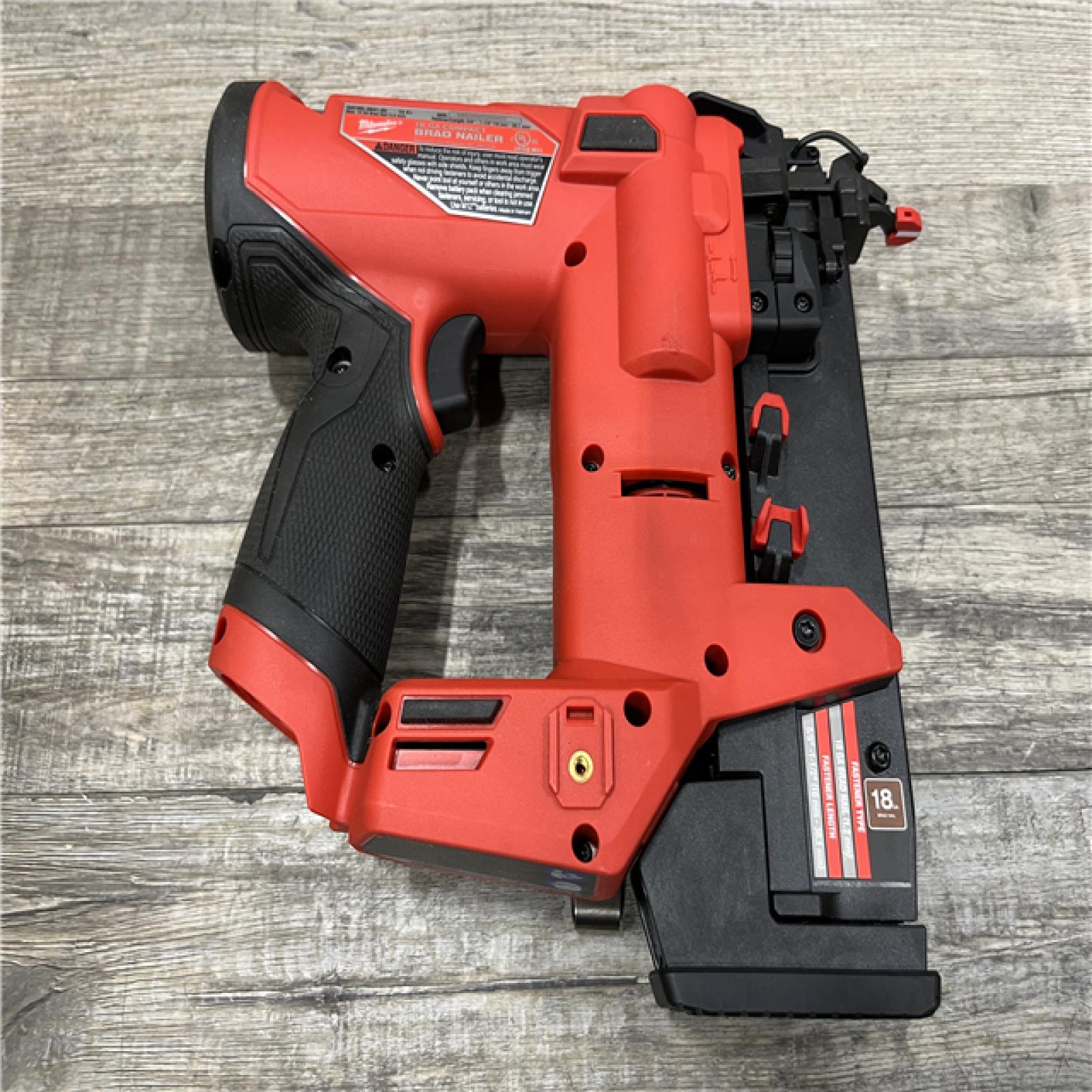 AS-IS Milwaukee FUEL 12-Volt Lithium-Ion Brushless Cordless 18-Gauge 1-1/2 in. Compact Brad Nailer (Tool-Only)