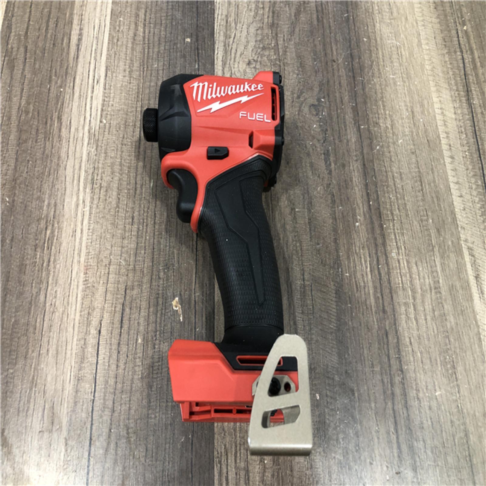 AS-IS Milwaukee FUEL SURGE 18V Lithium-Ion Brushless Cordless 1/4 in. Hex Impact Driver (Tool-Only)