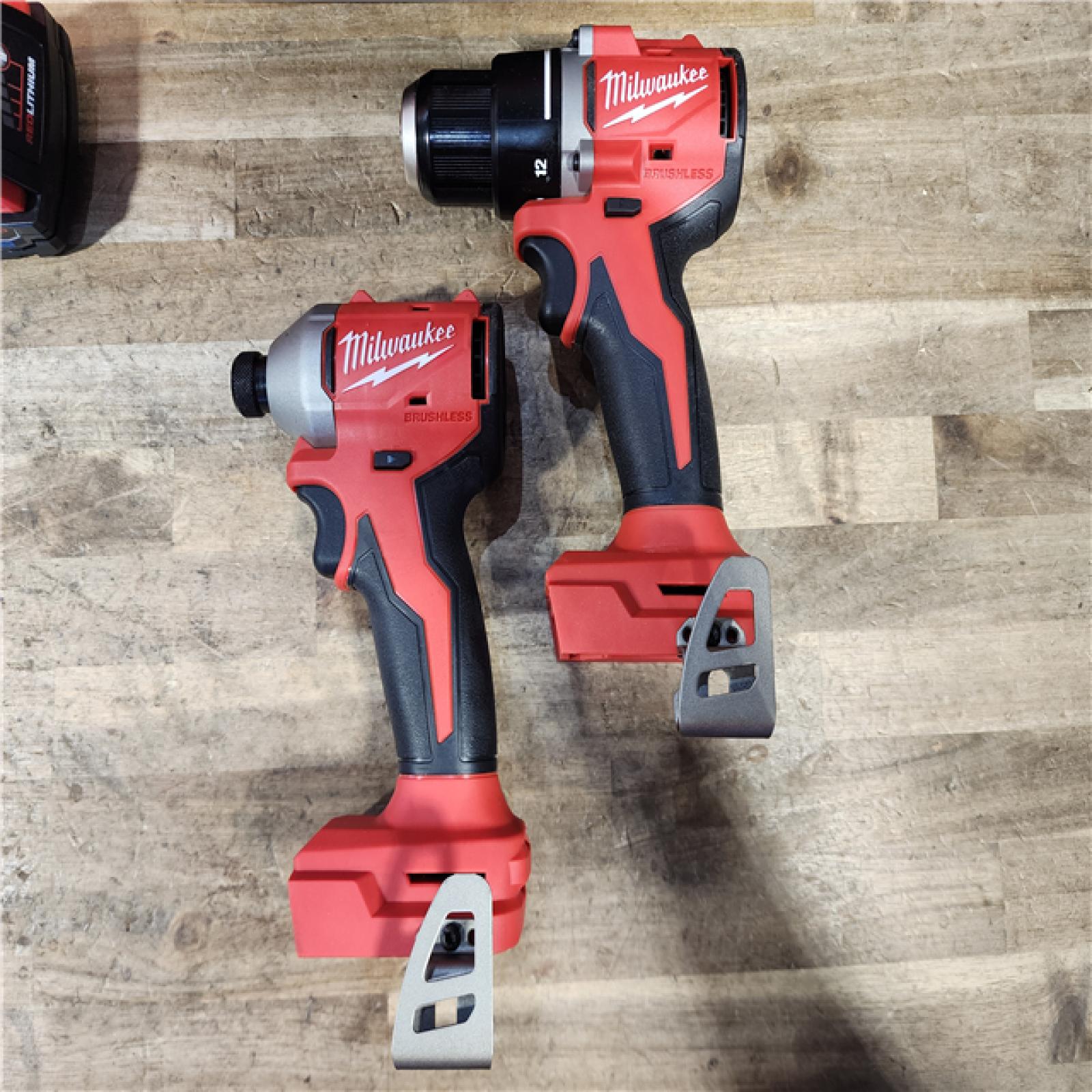 HOUSTON LOCATION - AS-IS Milwaukee M18 18V Lithium-Ion Brushless Cordless Compact Drill/Impact Combo Kit (2-Tool) W/(2) 2.0 Ah Batteries  Charger & Bag