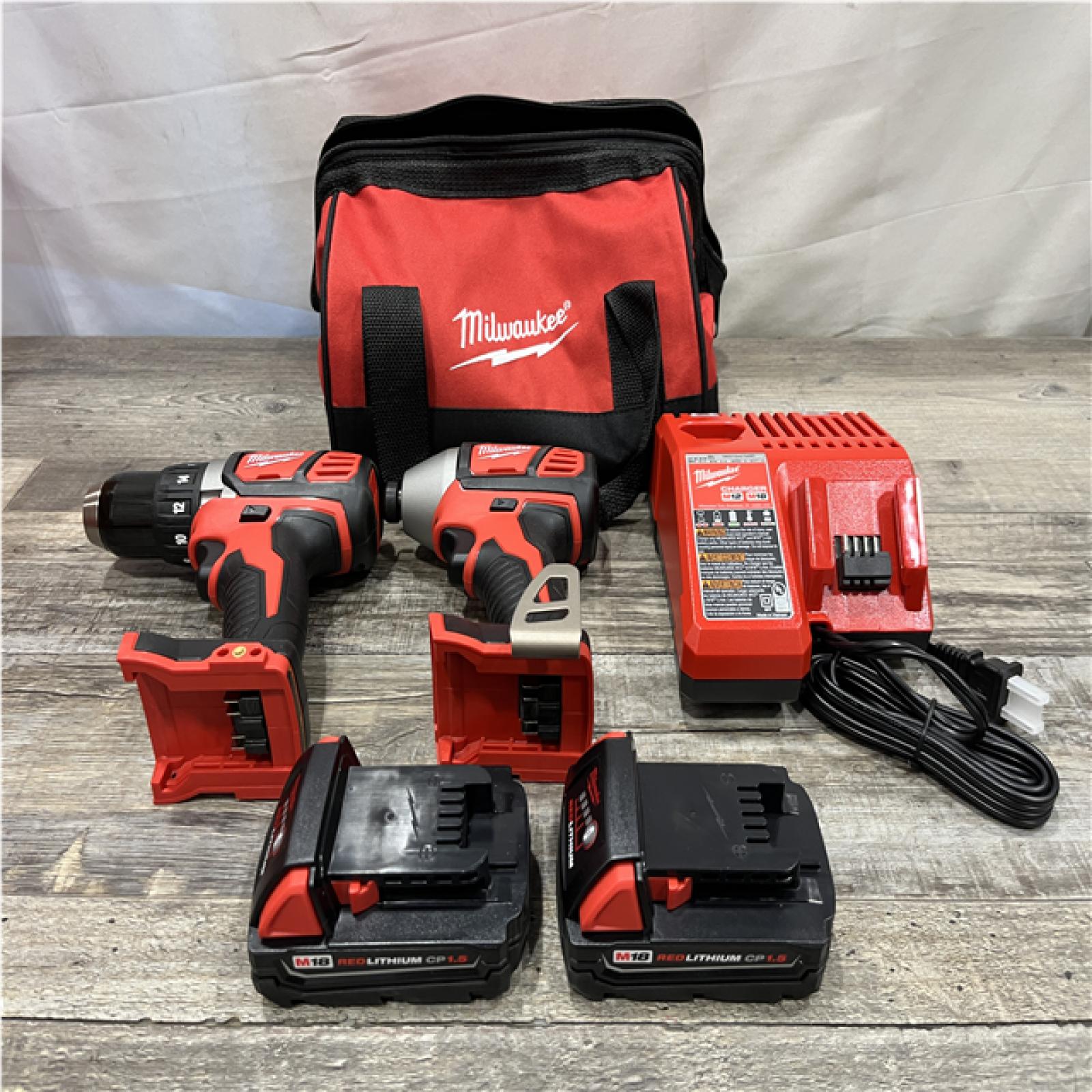 AS-IS Milwaukee 18V Lithium-Ion Cordless Drill Driver/Impact Driver Combo Kit