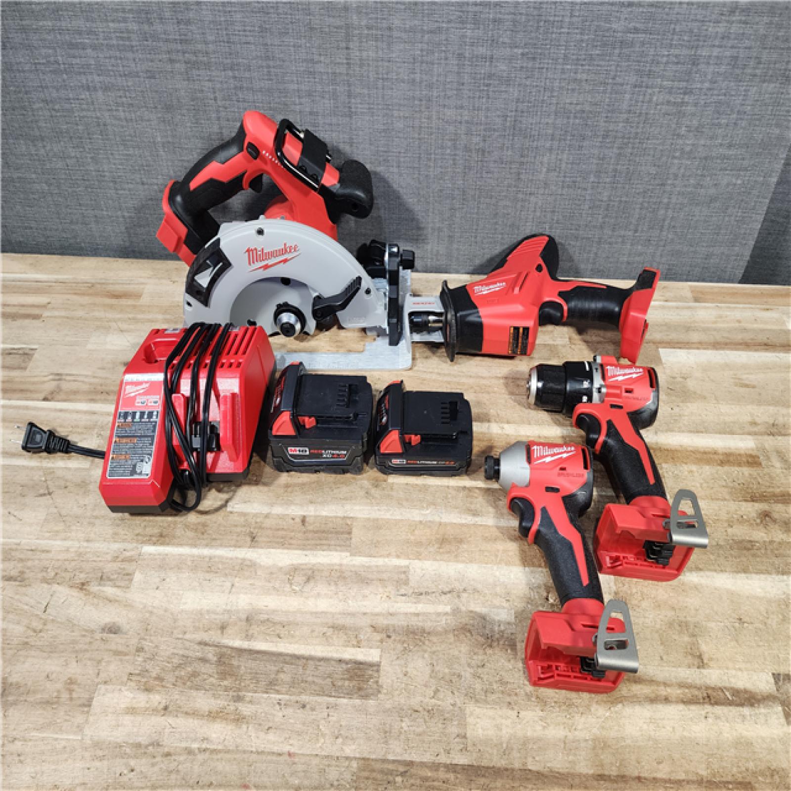 HOUSTON LOCATION - AS - IS Milwaukee 4 Tool Combo Kit W/ (2) Battery & Charger