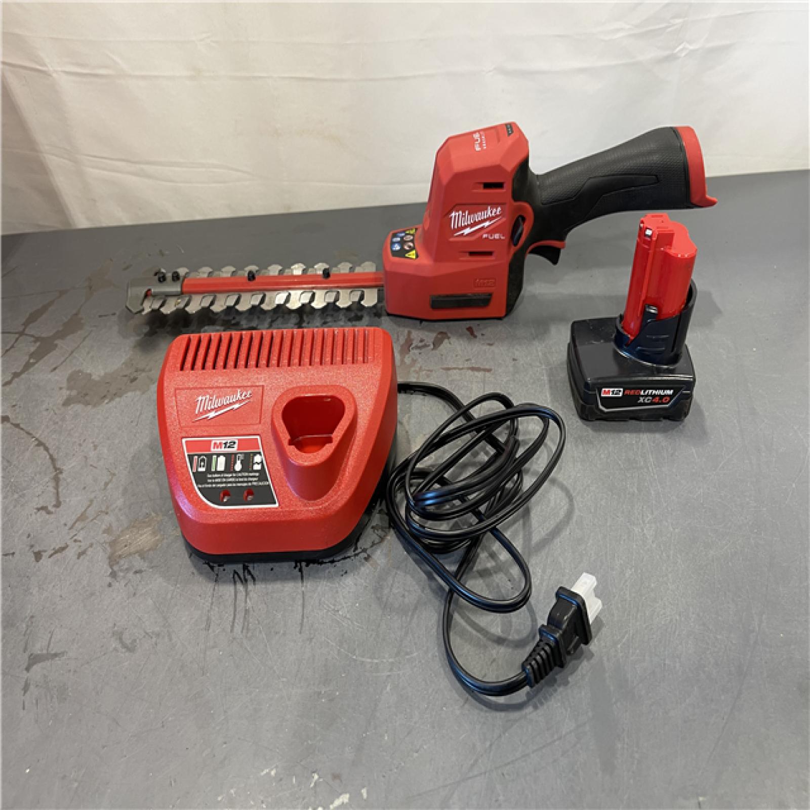 AS-IS - Milwaukee M12 FUEL 8 in. 12V Lithium-Ion Brushless Cordless Hedge Trimmer Kit