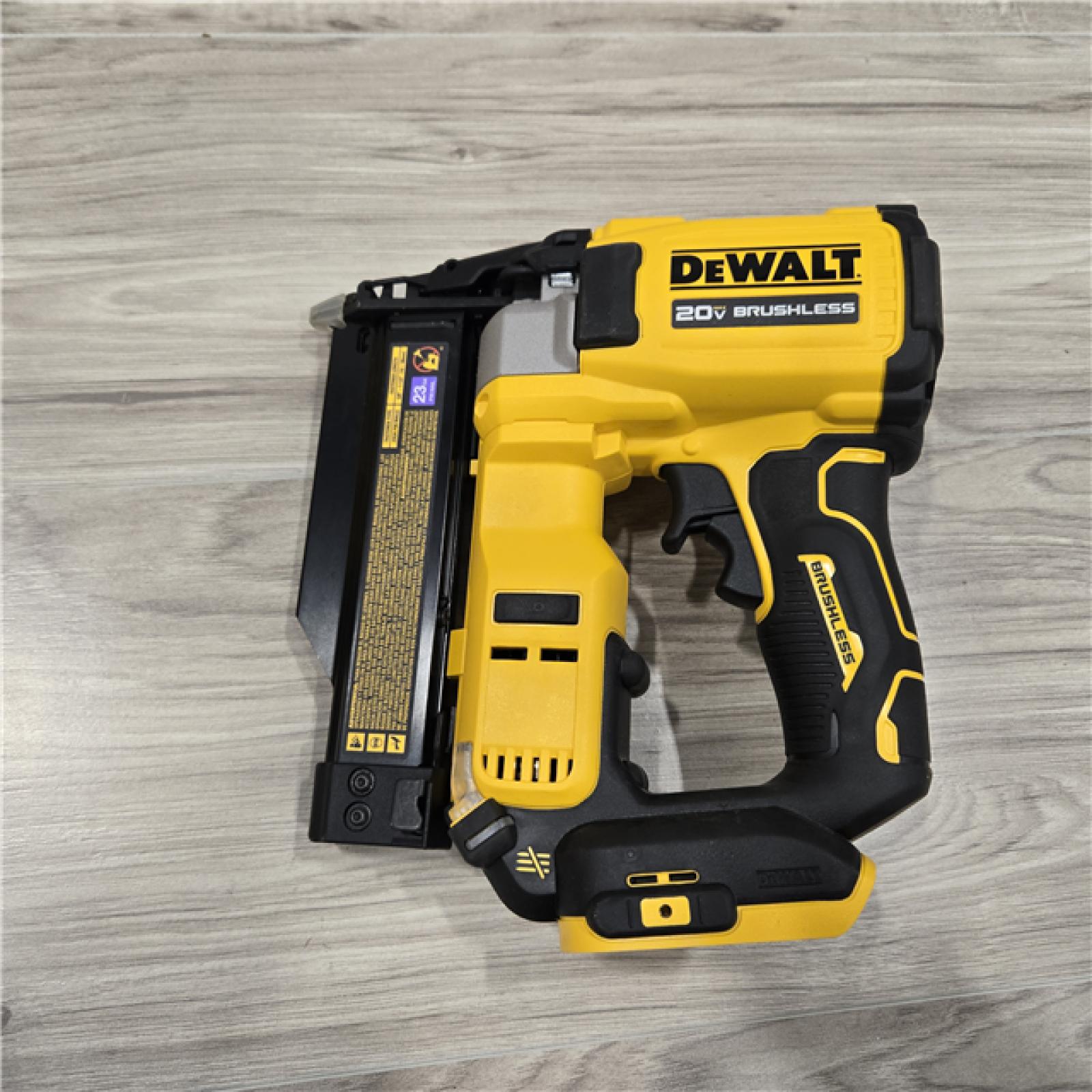 AS-IS DEWALT ATOMIC 20V MAX Lithium Ion Cordless 23 Gauge Pin Nailer Kit with 2.0Ah Battery and Charger