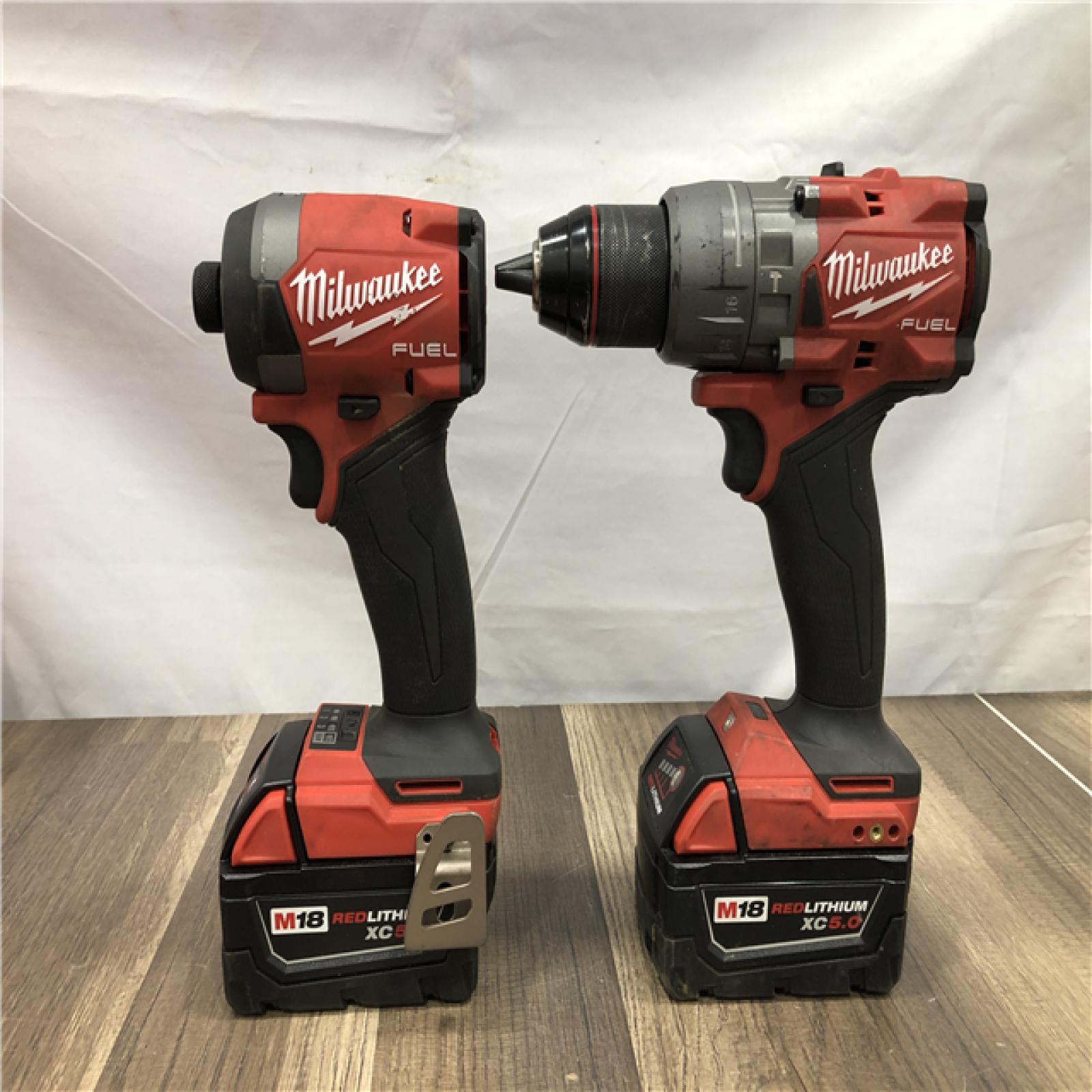AS-IS Milwaukee  FUEL 18V Lithium-Ion Brushless Cordless Hammer Drill and Impact Driver Combo Kit