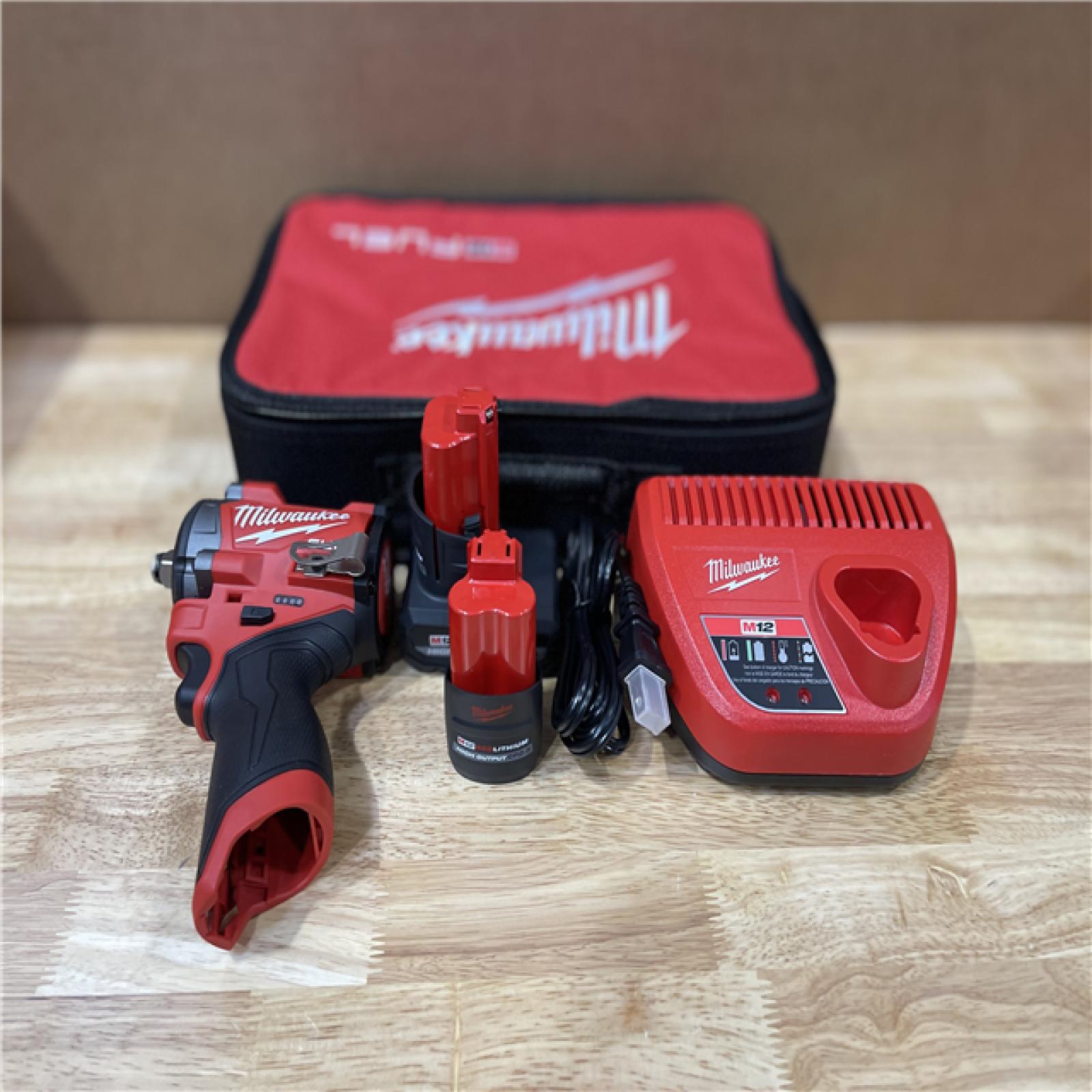 AS-IS Milwaukee FUEL 12V Li-Ion Brushless Cordless Stubby 1/2 in. Impact Wrench Kit