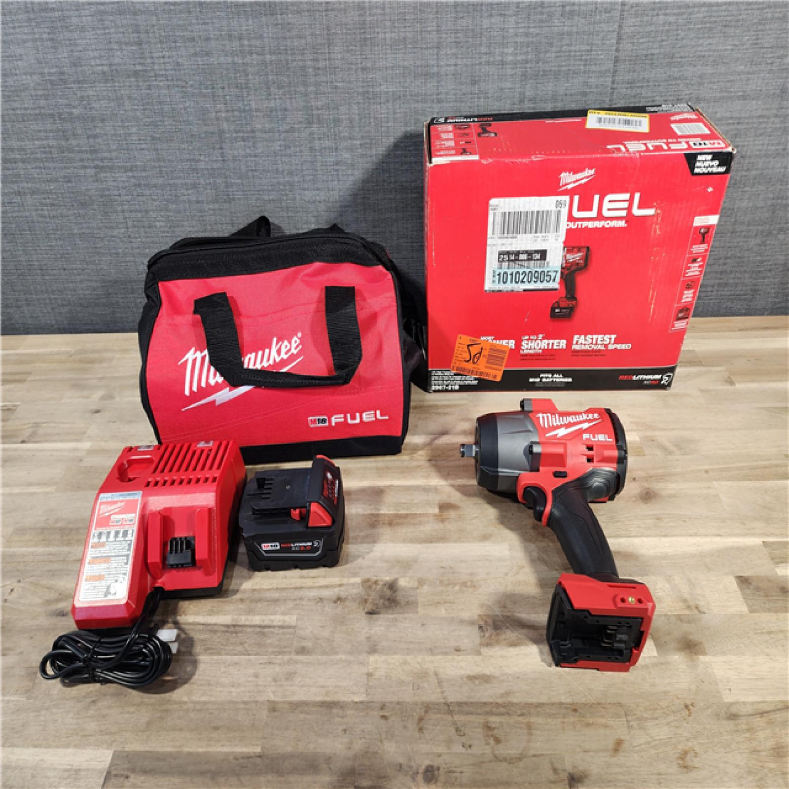HOUSTON LOCATION - AS-IS (APPEARS LIKE NEW) Milwaukee M18 1/2 in. Cordless Brushless High Torque Impact Wrench Kit (Battery & Charger)