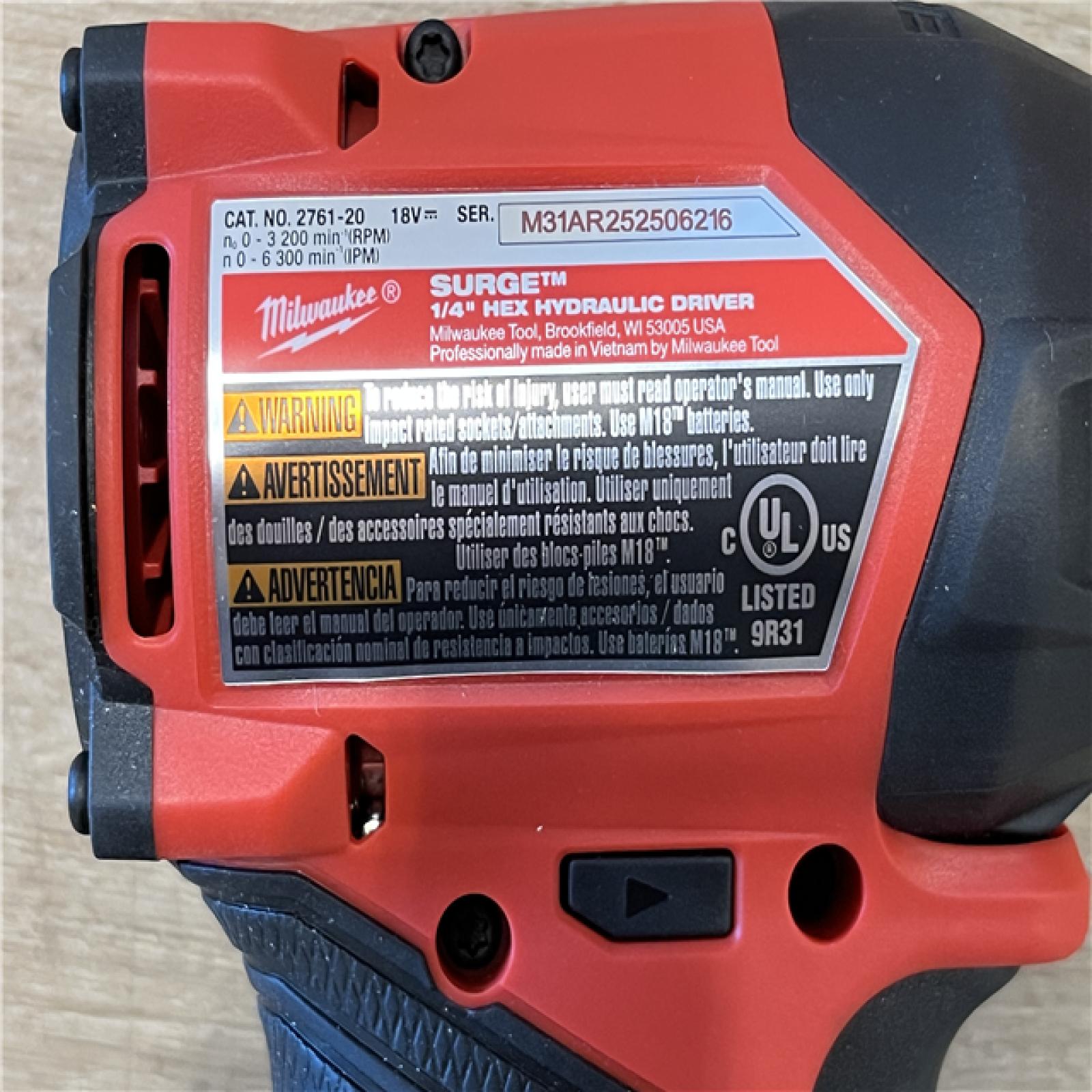 AS-IS  Milwaukee FUEL SURGE 18V Lithium-Ion Brushless Cordless 1/4 in. Hex Impact Driver (Tool-Only)