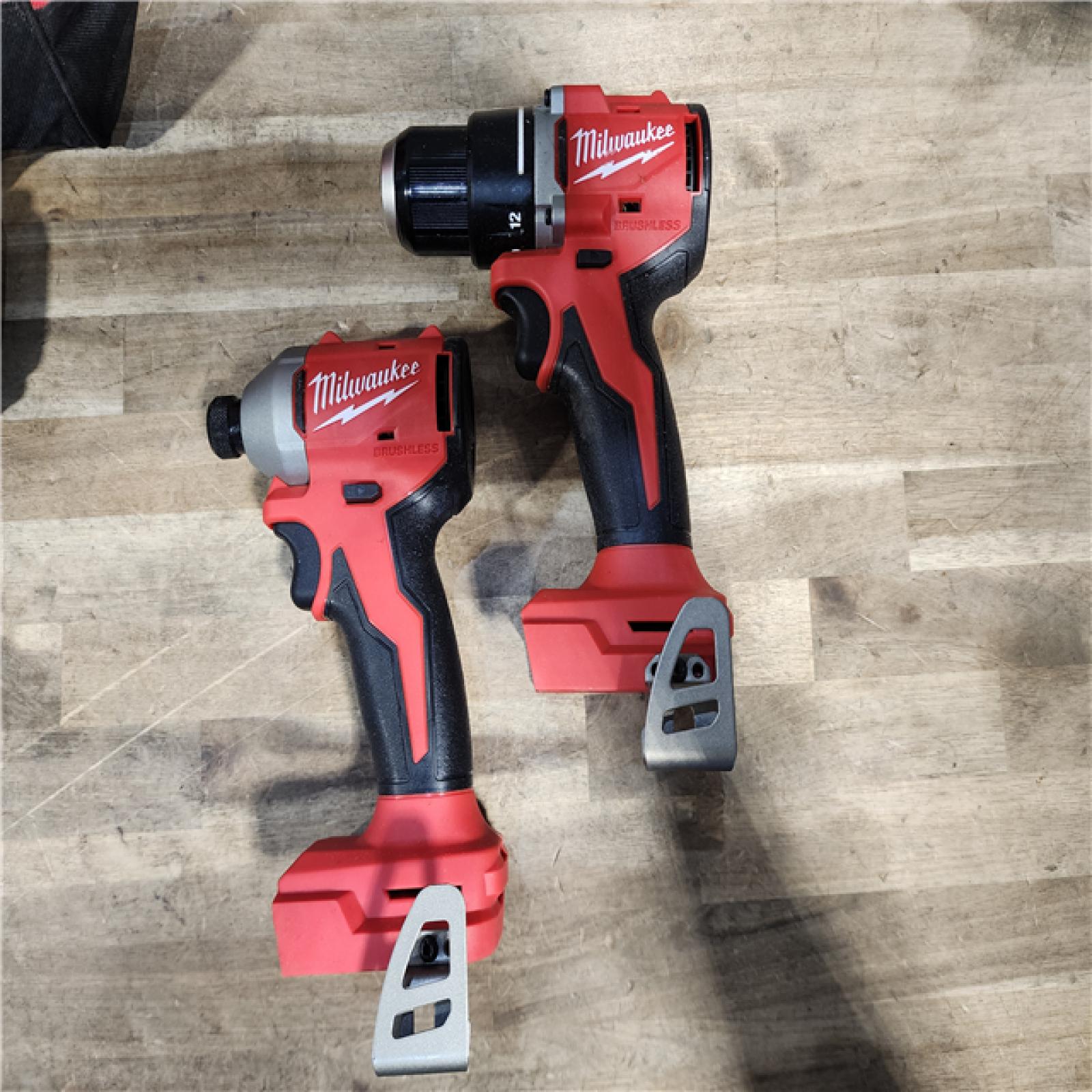 HOUSTON LOCATION - AS-IS Milwaukee M18 18V Lithium-Ion Brushless Cordless Compact Drill/Impact Combo Kit (2-Tool) W/(2) 2.0 Ah Batteries, Charger & Bag