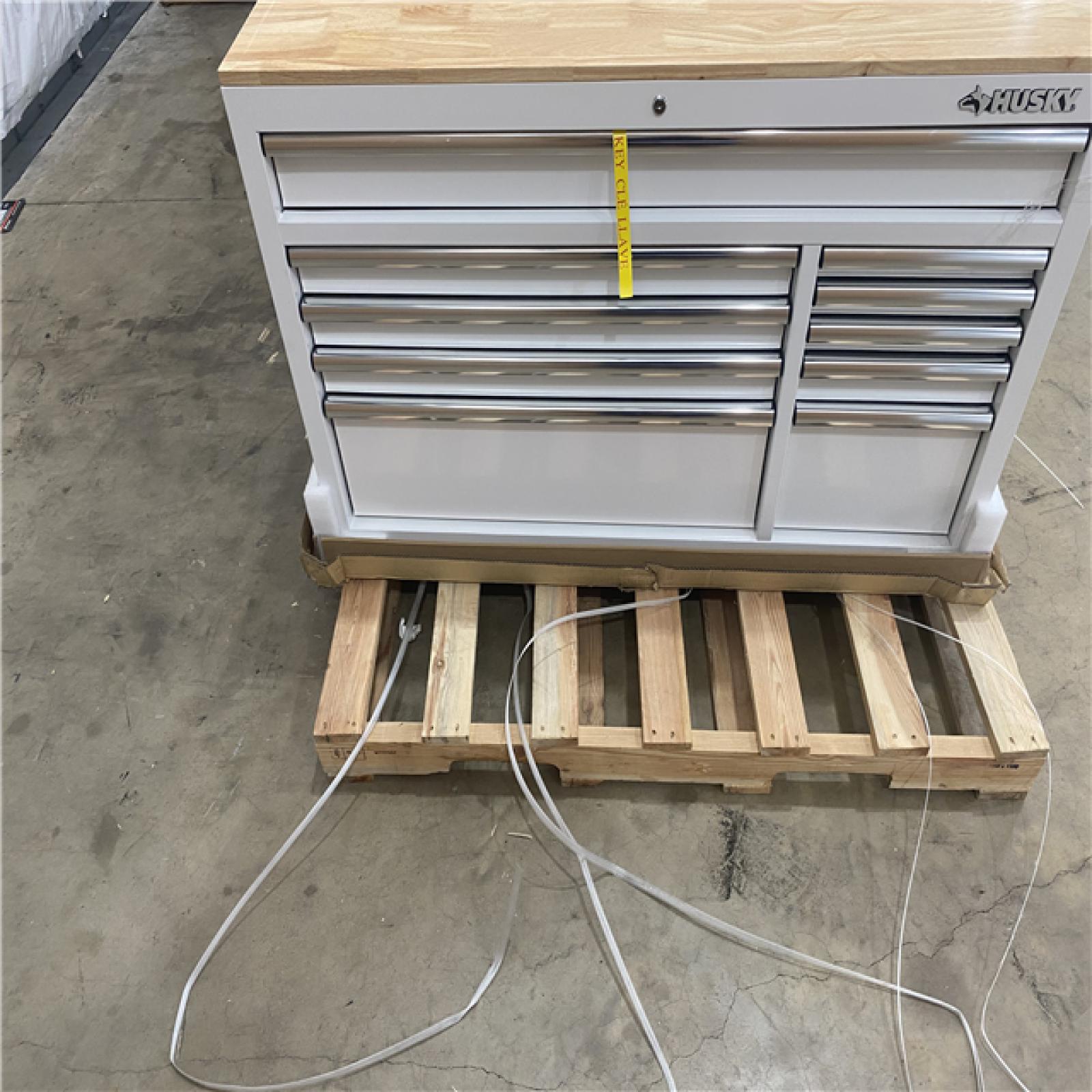 Houston Location - AS-IS home improvement pallet HUSKY 52IN 10 DRAWER MOBILE WORK BENCH