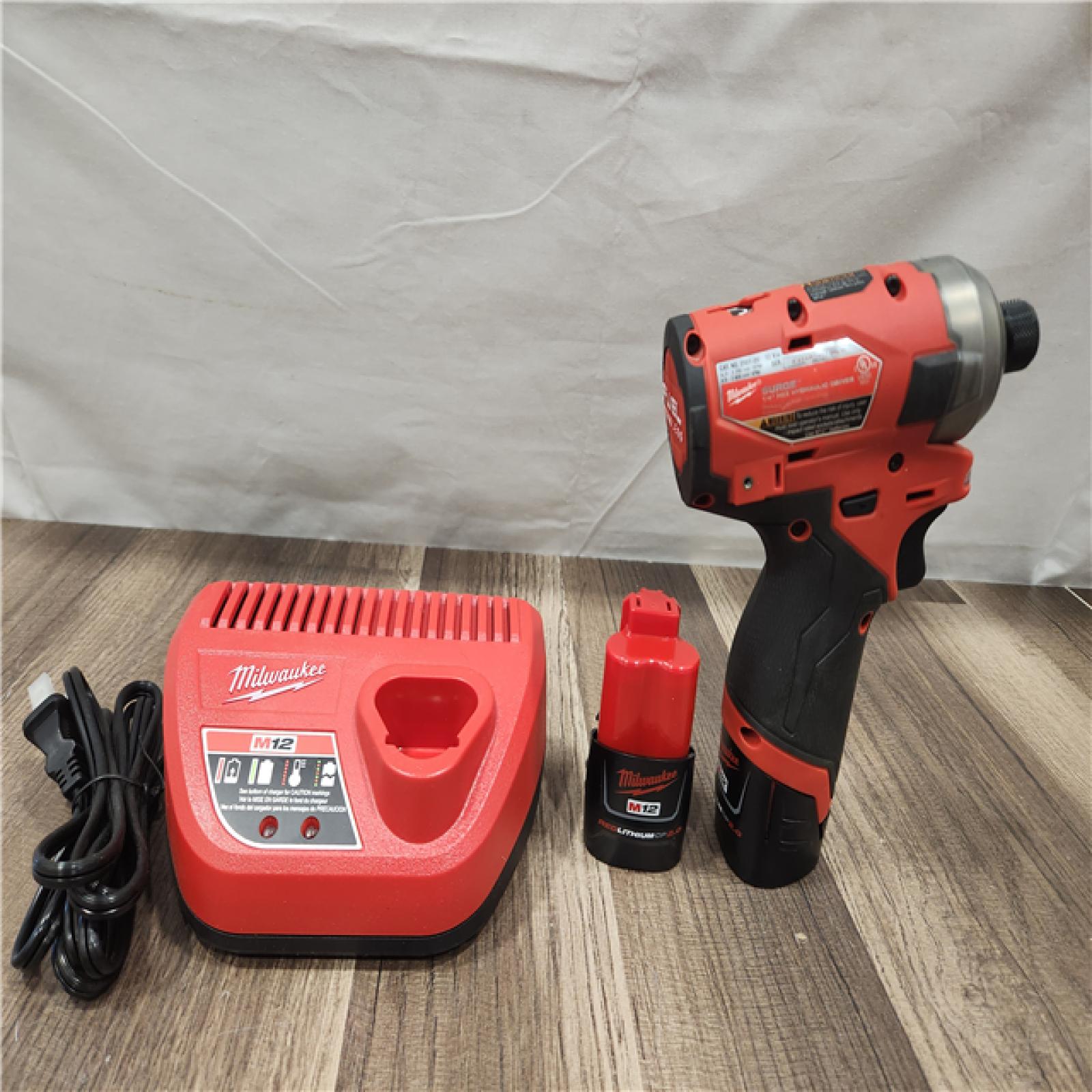 AS-IS- Milwaukee M12 FUEL SURGE 12V Lithium-Ion Brushless Cordless 1/4 in. Hex Impact Driver Compact Kit W/Two 2.0Ah Batteries  Bag