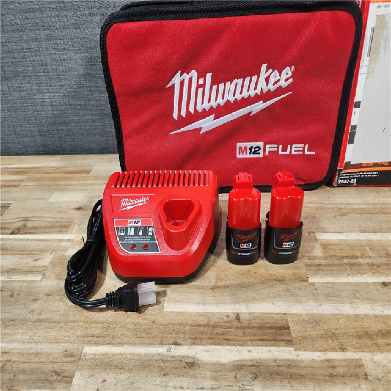 HOUSTON LOCATION - AS-IS (APPEARS LIKE NEW) Milwaukee M12 FUEL 12-Volt Lithium-Ion Brushless Cordless 3/8 in. Ratchet Kit with (2) 2.0Ah Batteries  Charger & Tool Bag