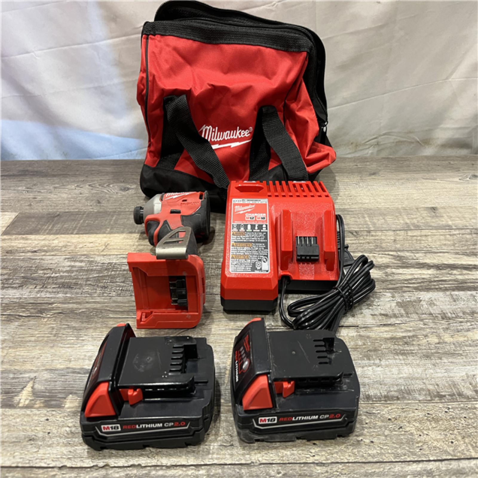 AS-IS Milwaukee 18V Lithium-Ion Brushless Cordless 1/4 in. Impact Driver Kit
