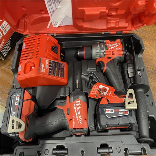 AS-IS MILWAUKEE M18 FUEL 18V Lithium-Ion Brushless Cordless Hammer Drill and Impact Driver Combo Kit (2-Tool) with 2 Batteries