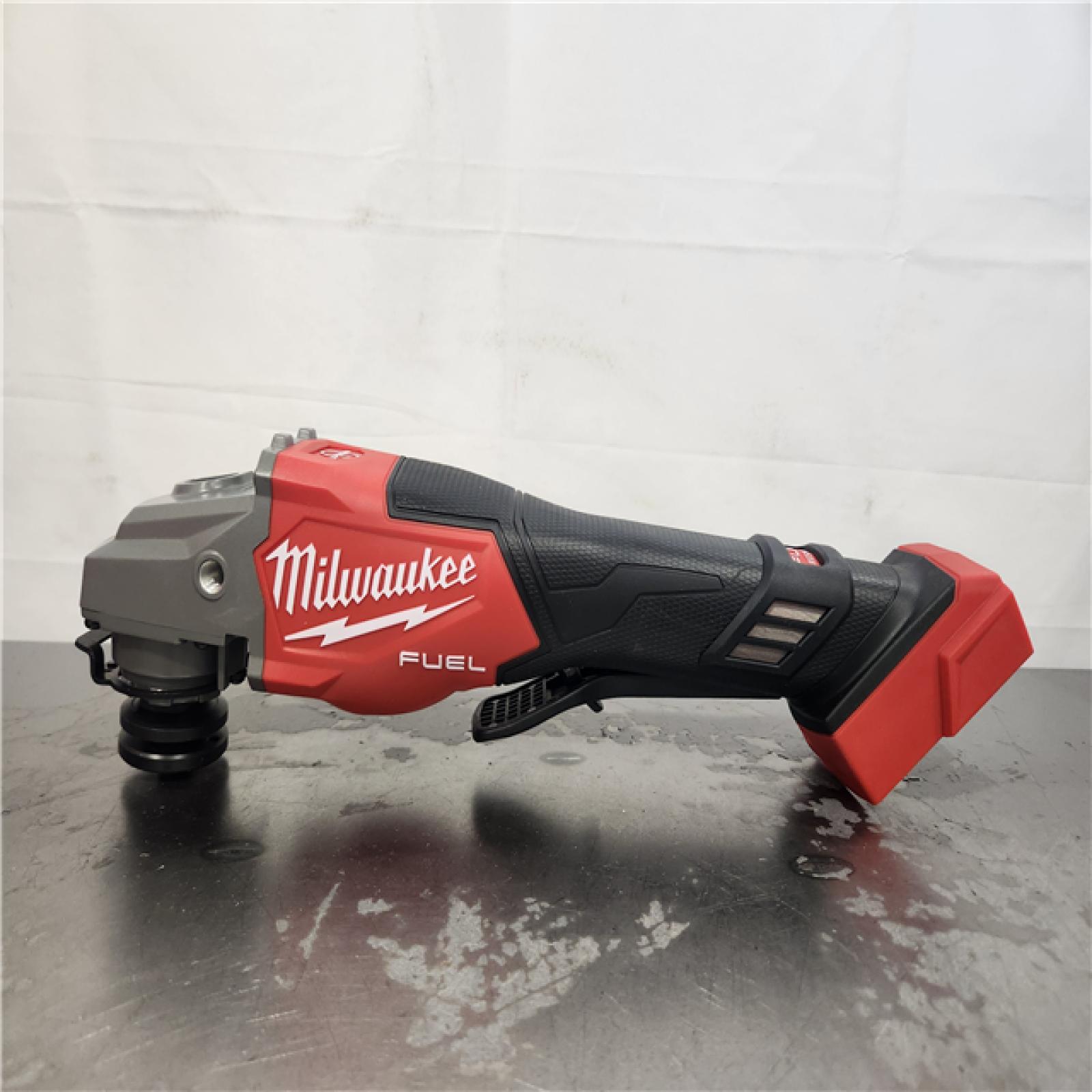 AS-IS- Milwaukee M18 FUEL 4-1/2-6 Cordless Braking Grinder  Paddle Switch (Tool-Only)