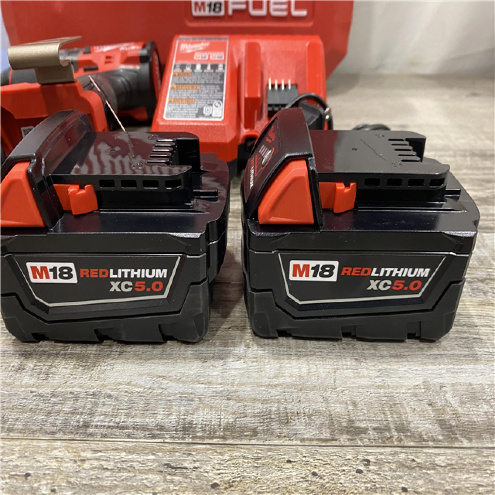 LIKE NEW - Milwaukee FUEL 18V Lithium-Ion Brushless Cordless 1/2 in. Hammer Drill Driver Kit