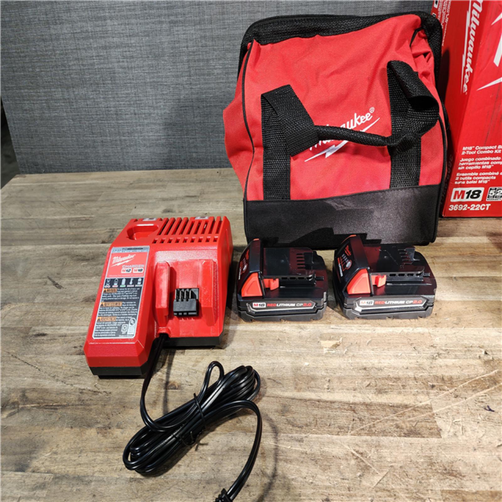 HOUSTON LOCATION - AS-IS Milwaukee M18 18V Lithium-Ion Brushless Cordless Compact Drill/Impact Combo Kit (2-Tool) W/(2) 2.0 Ah Batteries  Charger & Bag