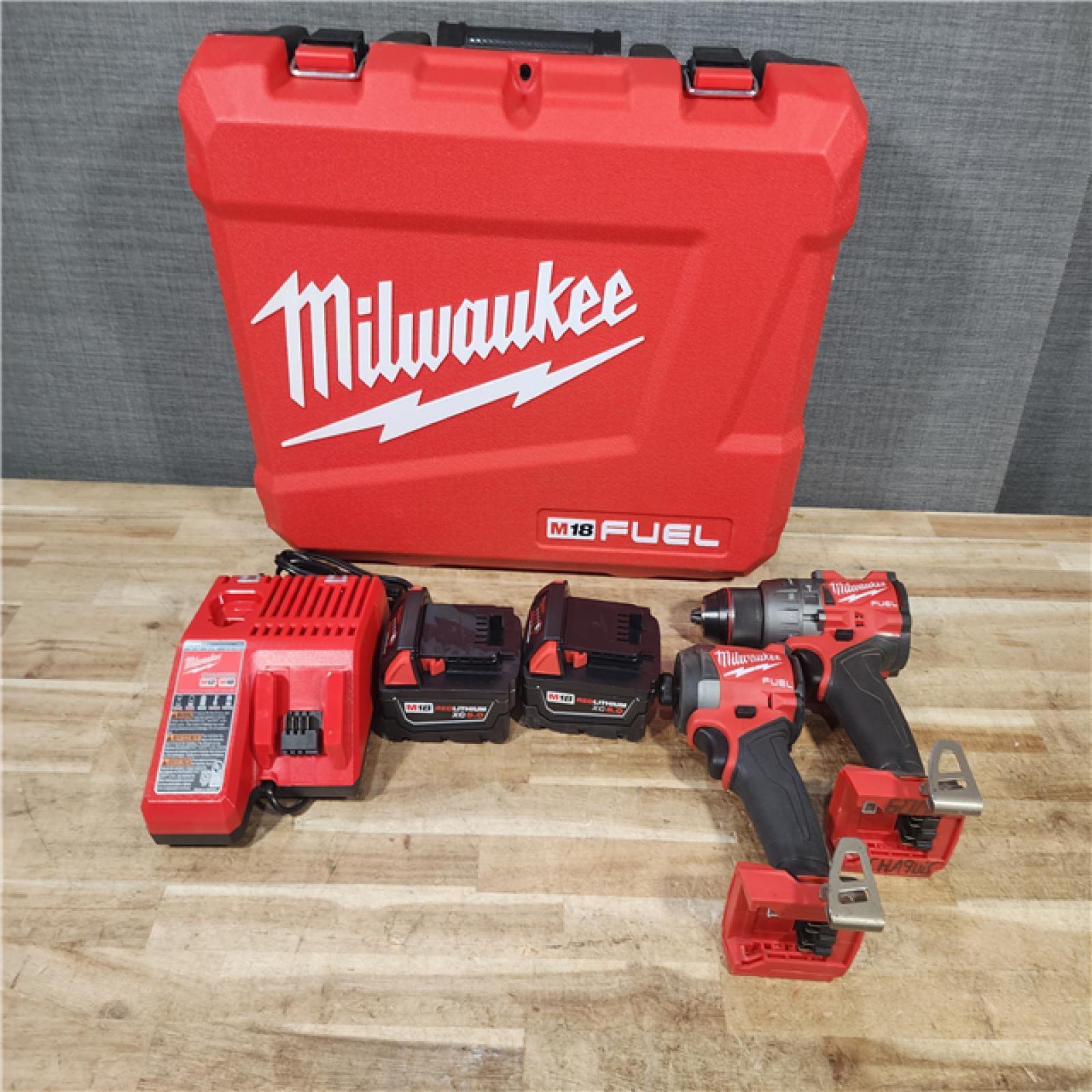 HOUSTON LOCATION - AS - IS Milwaukee FUEL 18V Lithium-Ion Brushless Cordless Hammer Drill and Impact Driver Combo Kit