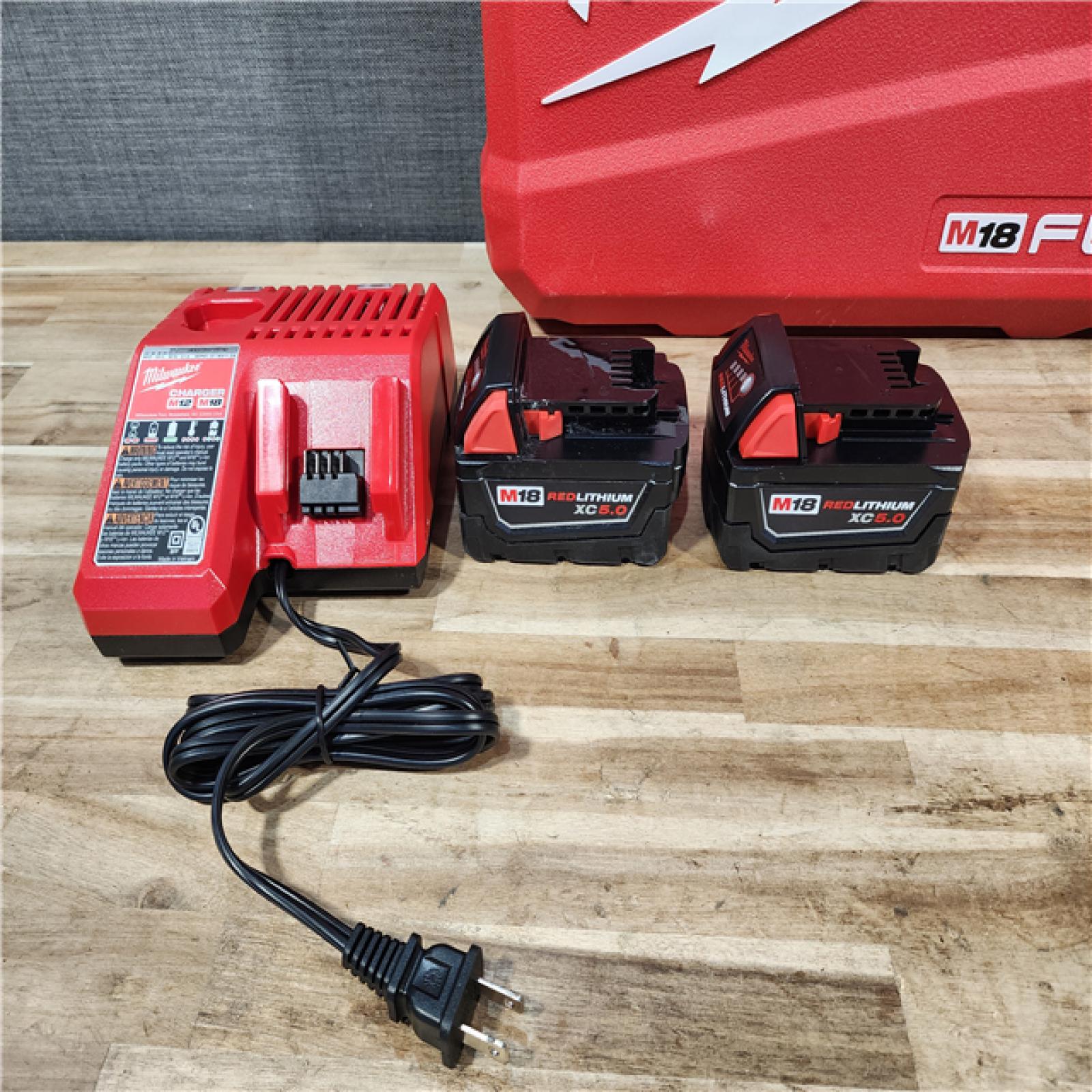 HOUSTON LOCATION - AS-IS (APPEARS LIKE NEW) Milwaukee FUEL 18V Lithium-Ion Brushless Cordless Hammer Drill and Impact Driver Combo Kit