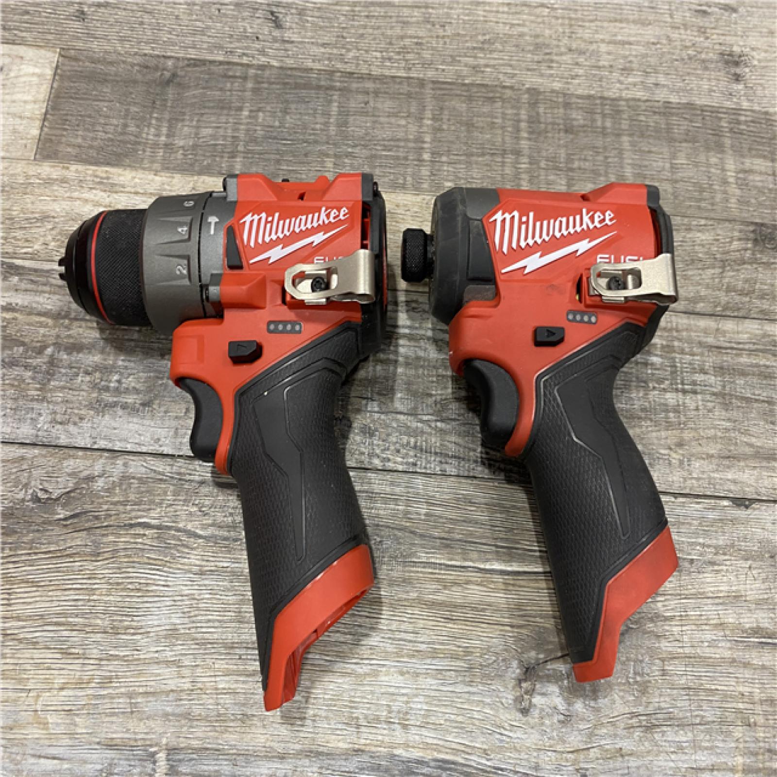 AS-IS Milwaukee FUEL 12-Volt Lithium-Ion Brushless Cordless Hammer Drill and Impact Driver Combo Kit