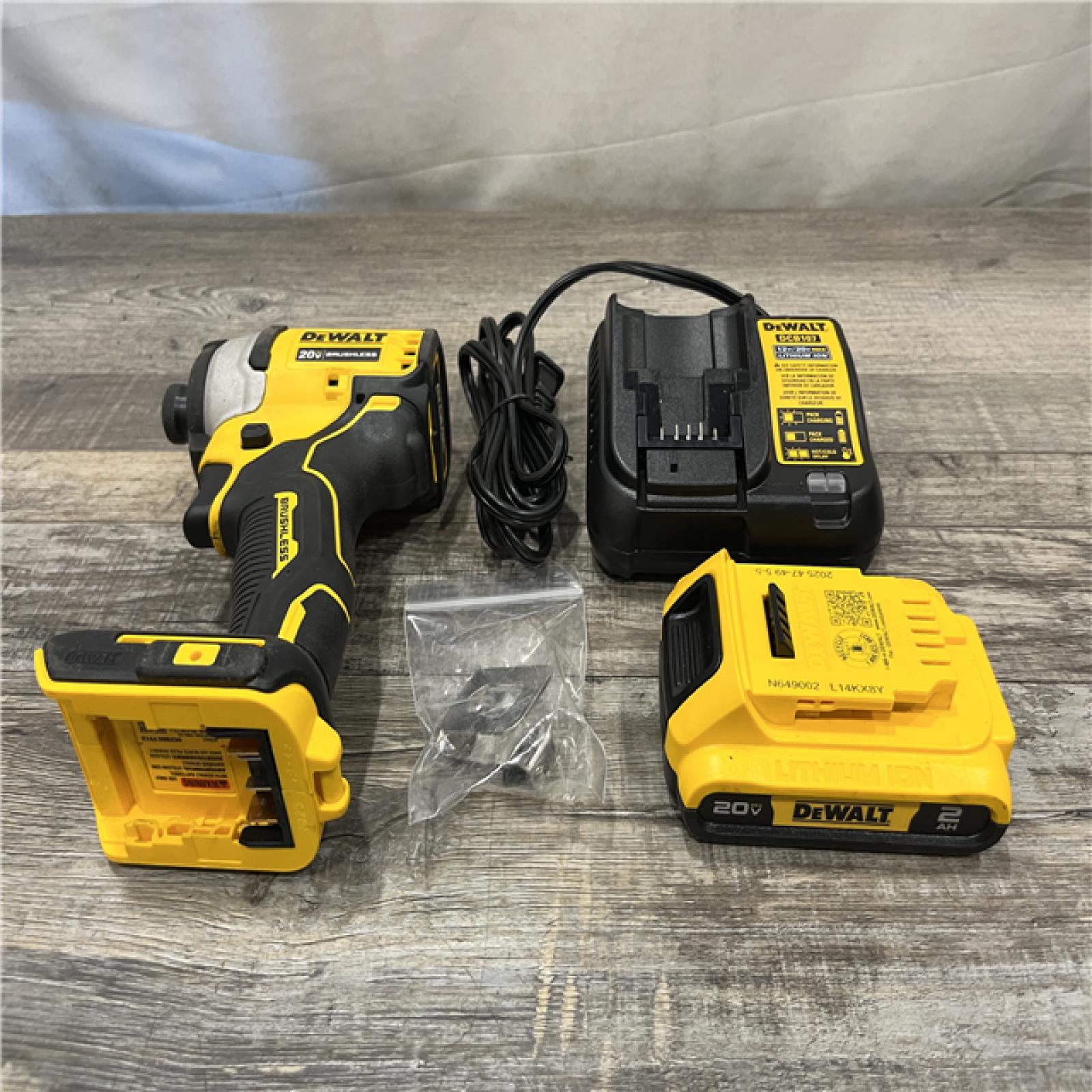 AS-IS DEWALT Atomic 20V Max Lithium-Ion Brushless Cordless Compact 1/4 in. Impact Driver Kit