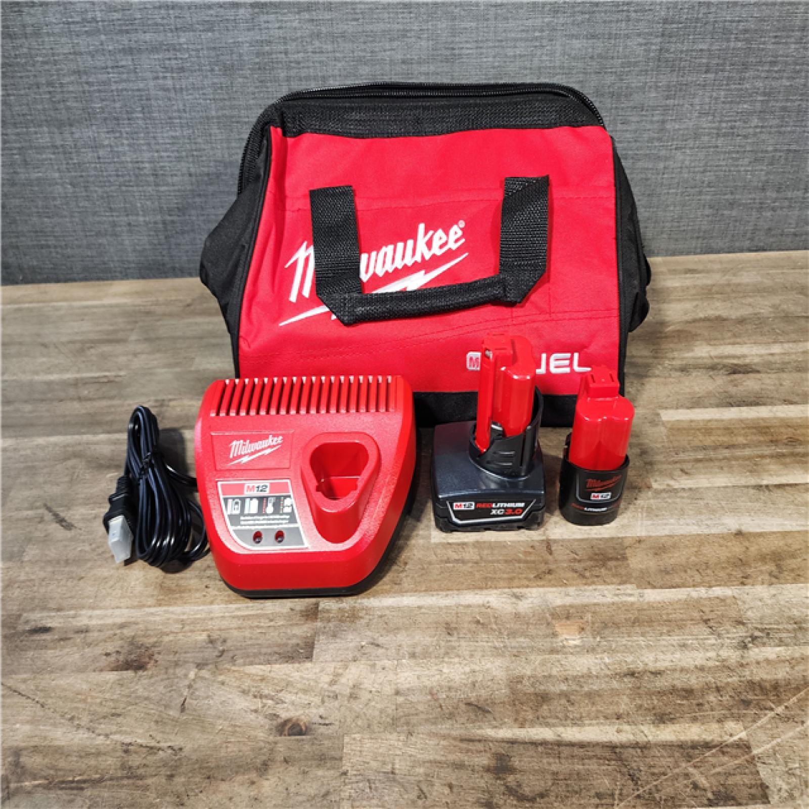 HOUSTON LOCATION - AS-IS Milwaukee FUEL 12-Volt Lithium-Ion Brushless Cordless Hammer Drill and Impact Driver Combo Kit