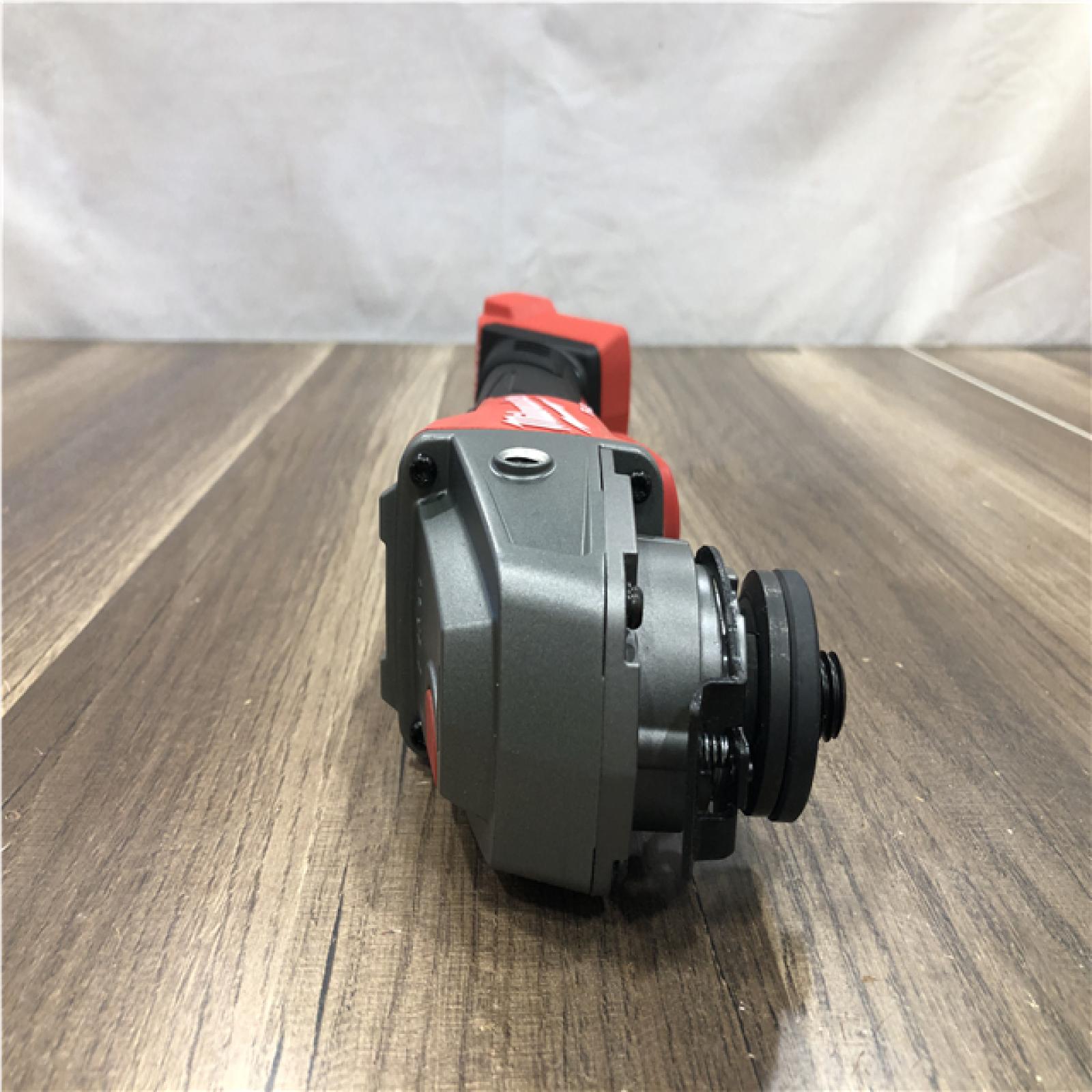 AS-IS Milwaukee FUEL 18V Lithium-Ion Brushless Cordless 4-1/2 in./5 in. Grinder with Variable Speed & Paddle Switch (Tool-Only)