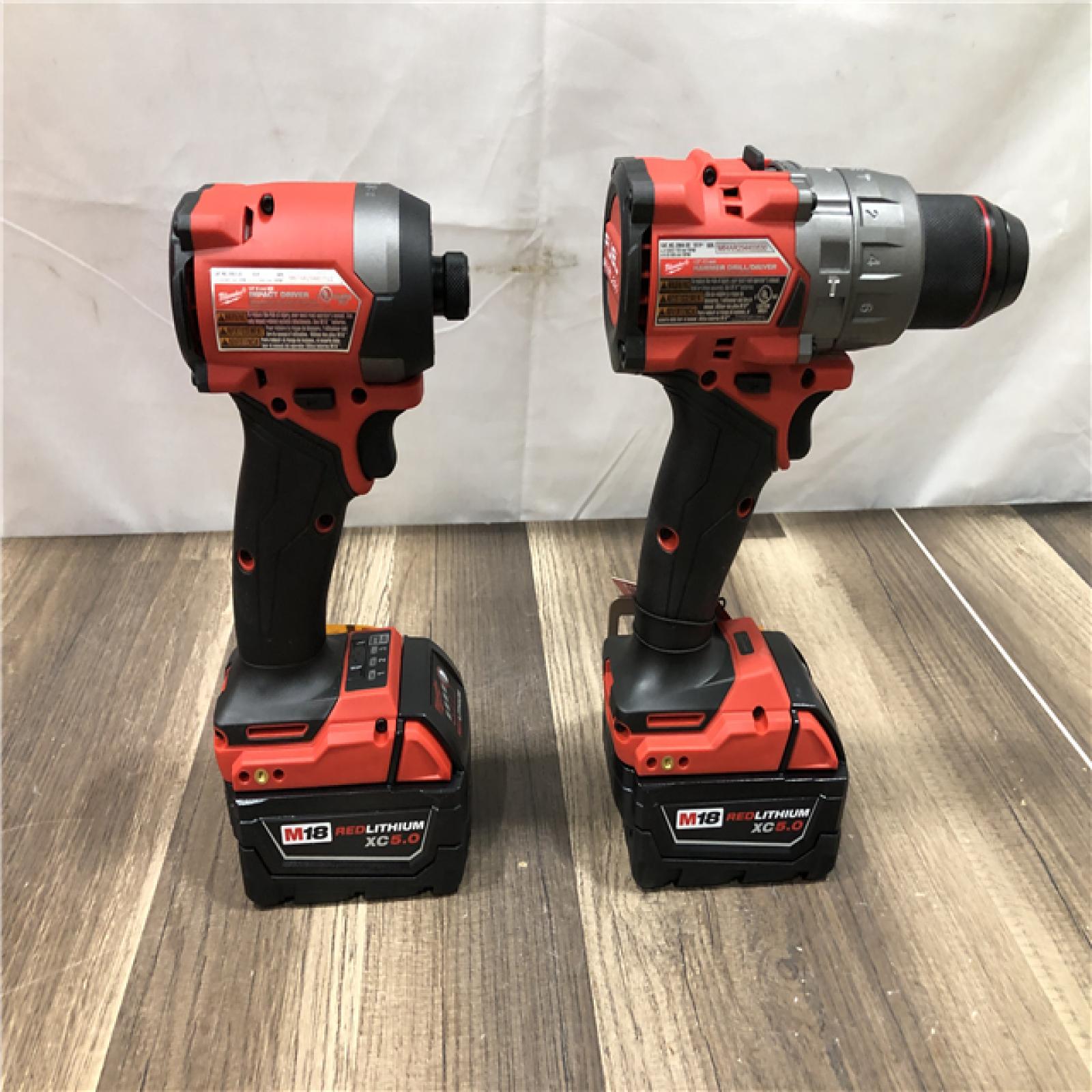 AS-IS Milwaukee FUEL 18V Lithium-Ion Brushless Cordless Hammer Drill and Impact Driver Combo Kit