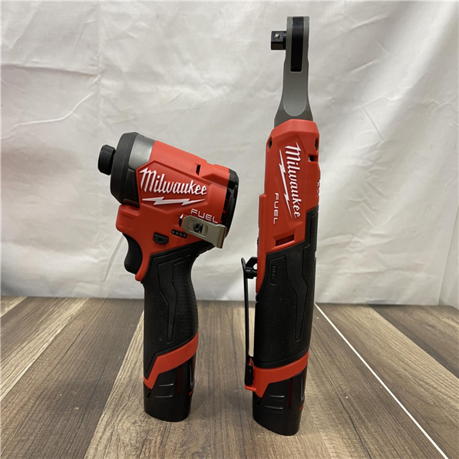 AS-IS Milwaukee M12 FUEL 12V Lithium-Ion Cordless 3/8 in. Ratchet and 1/4 in. Impact Driver Kit
